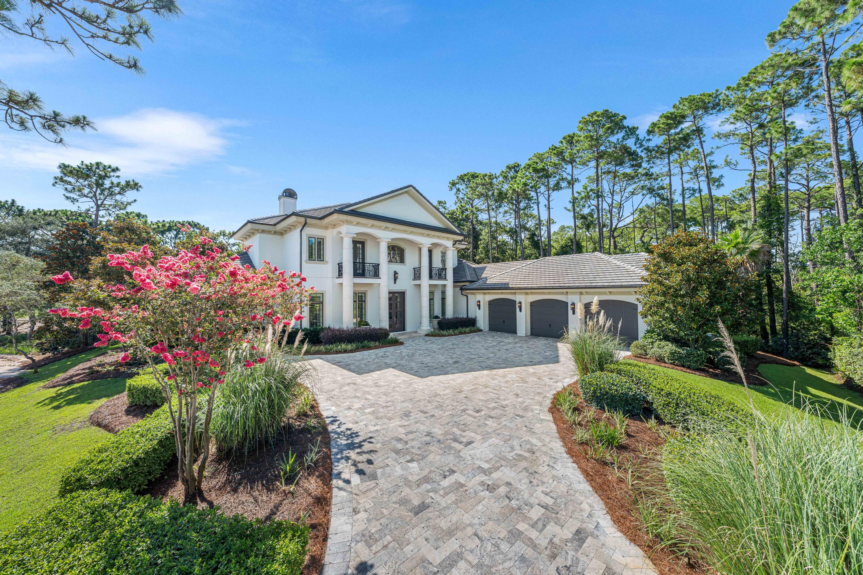 Welcome to 3570 Preserve Drive, an architectural masterpiece perfectly positioned on an estate-sized cul-de-sac lot overlooking the 4th green of the private Burnt Pine Golf Course. Located within the prestigious, double-gated, non-rental community of Burnt Pine at Sandestin Golf and Beach Resort, this nearly 7,000 square foot residence was originally constructed as a private home by one of the Southeast's premier builders and later elevated in collaboration with Christopher K. Coffin Design of Scottsdale, Arizona.

The home showcases masterful craftsmanship, timeless finishes, and meticulous attention to detail. A grand foyer with soaring ceilings, a sweeping staircase, and a custom Dennis & Leen Palace chandelier sets an elegant tone upon entry. The expansive layout blends formal and casual living with effortless flow to the outdoors. The chef's kitchen centers around an oversized Calcutta marble island and features professional-grade appliances, a Francois & Co. pewter range hood with antique brass detailing, Waterstone fixtures, and a Shaw farmhouse sink. Adjacent is a 700-bottle wine cellar finished with Phillip Jeffries gold leaf wallpaper and a custom Paul Ferrante lantern, enclosed behind a striking steel and glass door. The nearby butler's pantry adds additional custom cabinetry, antique mirrored tile, and quartz countertops for seamless entertaining.

The living room is anchored by a statement Francois & Co. limestone fireplace, creating an elegant focal point and inviting atmosphere for gatherings. A highlight of the home is the oversized Florida Room, flanked by retractable patio doors for year-round use. This space offers a full bar with sink, ice maker, dishwasher, and a cozy fireplace, all overlooking the resort-style pool, spa, and screened lanai.

The main-level primary suite is a private retreat featuring wide-plank wood floors, a custom chandelier, dual vanities, a make-up counter, marble finishes throughout, and his-and-her walk-in closets. Also on the main level are a richly appointed office with custom built-ins and an additional guest suite with an ensuite bath.

Upstairs, three more spacious guest suites each feature private ensuite bathrooms. A second laundry room, generous family media room, and an outdoor balcony with sweeping views complete the second level. Additional features include an oversized three-car garage with built-in storage, lush landscaping, and refined finishes throughout.

This exceptional residence offers the pinnacle of luxury living along the Emerald Coast, all within close proximity to Sandestin's championship golf courses, marina, tennis center, private beach, and the upscale shops and dining of Grand Boulevard. Shown by private appointment only.