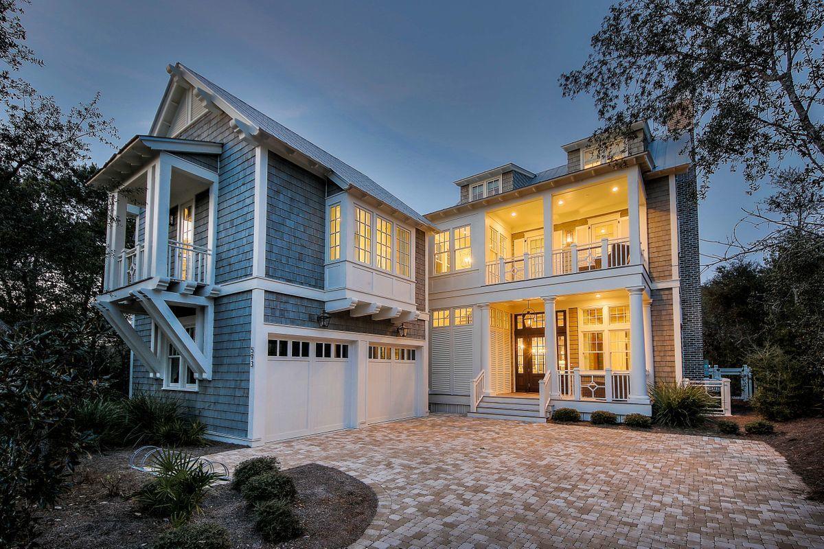 Sophisticated WaterColor Home in Premier Location. This luxury home is one of the newest properties built in Phase I of WaterColor and is only a short walk to Marina Park and the WaterColor Town Center. Expertly designed by architect Paul Geary, this elegant home was built by Daniel Cole in 2016 and features several upscale touches throughout, including reclaimed beams and flooring, transom windows on the main level, pecky cypress doors in some areas of the home, Lincoln marble granite counter tops, a Wolf range in the gourmet kitchen, and a surround sound system. This 3,600 square foot home offers an open floor plan and also includes a two car garage With twelve-foot ceilings on the main level and a sand room off the kitchen for additional storage, This spacious home also includes two laundry areas and a second living area that can be found on the third floor. An elevator can easily be added to the property, as there is an existing elevator closet already located within the home. Well-maintained by its original owners, this property is being sold furnished and is move-in ready. While there are plenty of places to relax indoors, you can also enjoy sunny days and warm weather from several outdoor entertaining areas. Take advantage of a number of covered porch spaces featuring high-quality Ipe decking. Additional outdoor features include a heated saltwater pool and spa as well as a pergola with a TV and wood-burning fireplace. The property backs up to green space on two sides, allowing for additional privacy. This home is just a few blocks from the WaterColor Beach Club and additional WaterColor amenities. Located adjacent to the LakeHouse for convenient access to water activities, and with miles of walking and biking trails steps from the back door, this is a perfect family home or investment property