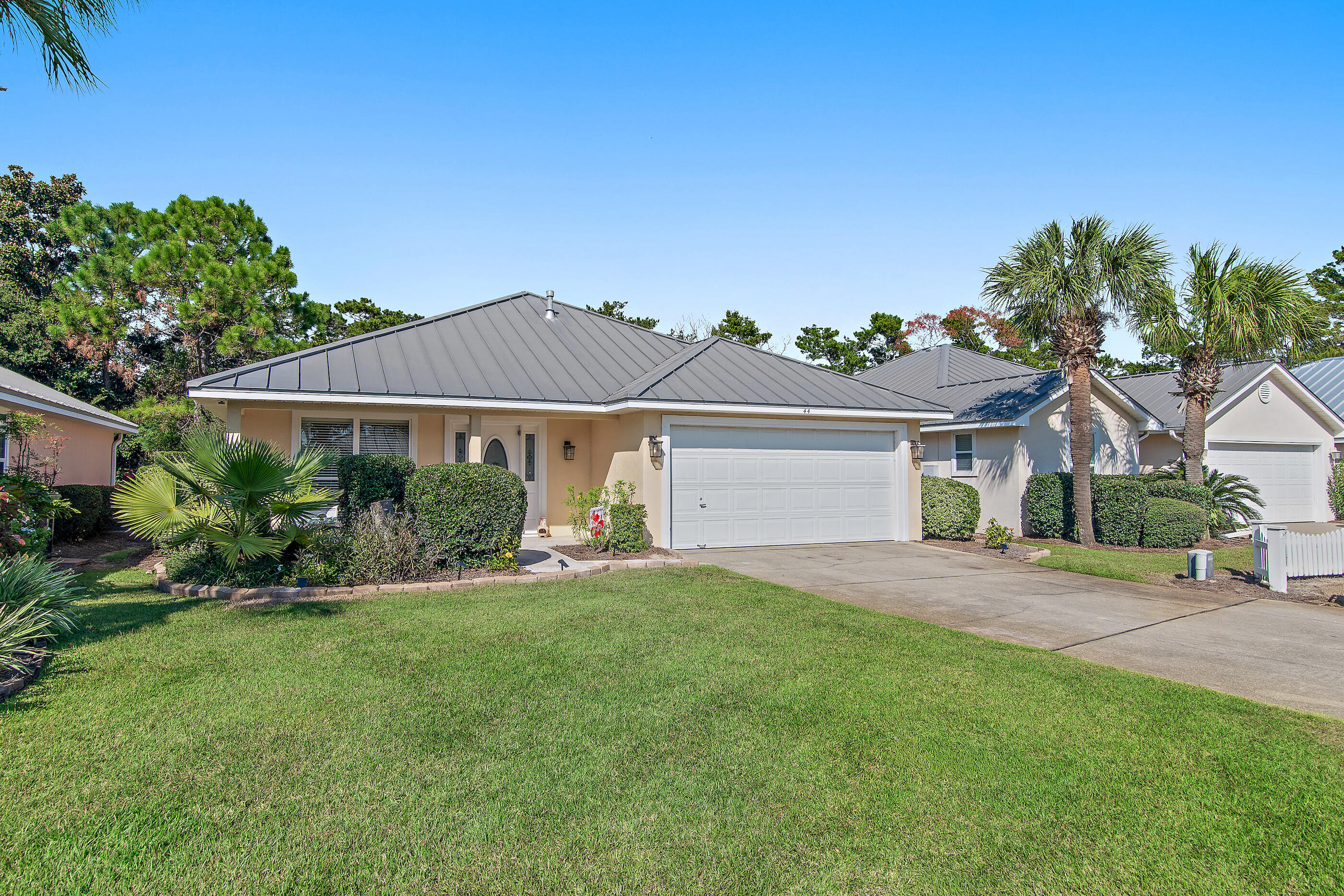 Welcome to 44 St. Thomas Drive, a charming 3-bedroom, 2-bath coastal cottage nestled in the gated Maravilla Resort community of Miramar Beach. Perfectly positioned just a short walk from the sugar-white sands of the Emerald Coast, this home offers the ideal blend of comfort, convenience, and coastal living. With an open-concept layout, abundant natural light, and a spacious two-car garage, this property is ideal for use as a full-time residence, vacation home, or investment property. Residents of Maravilla Resort enjoy private beach access to over 2.5 acres of pristine shoreline, ensuring endless days of sun and surf. The community also features two sparkling swimming pools (one seasonally heated), a relaxing hot tub, and beautifully maintained walking paths surrounded by lush landscaping. Outdoor grilling areas and picnic spots make it easy to enjoy the Florida sunshine with family and friends.

For those who love to stay active, Maravilla offers a fully equipped fitness center, tennis and pickleball courts, shuffleboard, and basketball courts. Whether you're starting your morning with a workout or winding down with a sunset stroll, this neighborhood provides something for everyone. The gated entrance adds peace of mind, while pet-friendly policies and open green spaces make it welcoming for all.

Located in the heart of Miramar Beach, Maravilla is just minutes from beachfront restaurants, charming cafés, shopping, and entertainment along Scenic Gulf Drive. Combining resort-style amenities with a relaxed beach-town feel, 44 St. Thomas Drive captures the essence of the Emerald Coast lifestylewhere every day feels like a vacation.