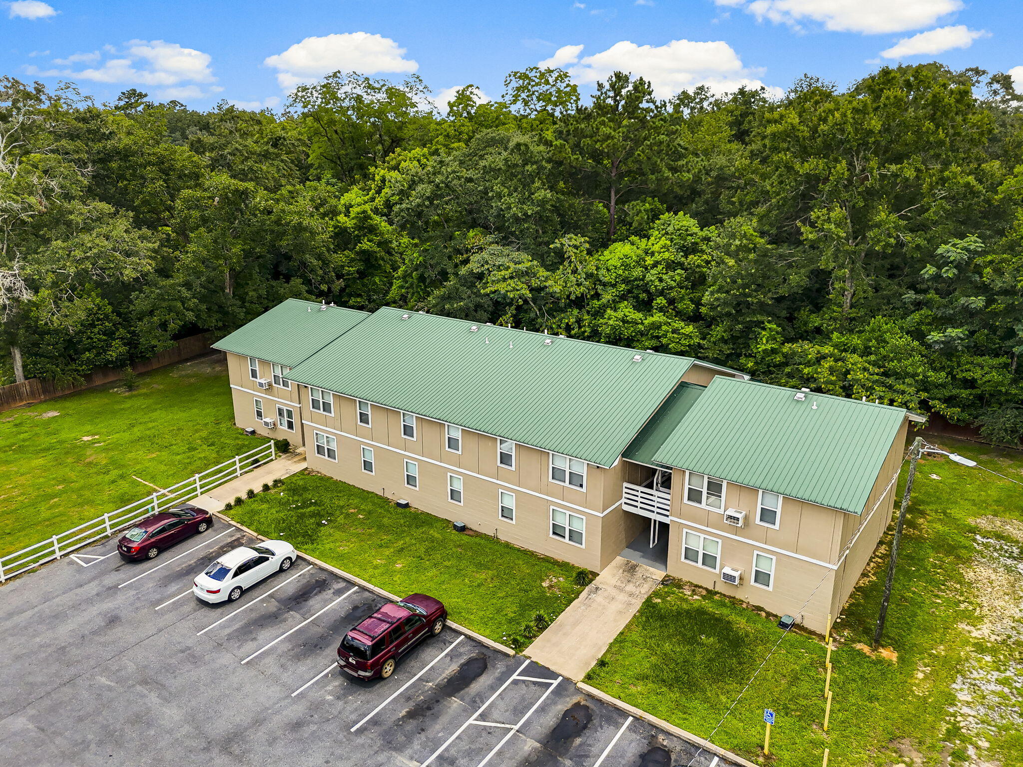 ANOTHER $100,000 PRICE REDUCTION! Deerwood Apartments is a fully occupied 16-unit multifamily asset offering immediate cash flow, significant recent capital improvements, and exceptional upside potential. The property features (8) 1BR/1BA units and (8) 2BR/1BA units, with approximately $350,000 invested in upgrades including a new septic system, new parking lot, full exterior repaint, updated on-site laundry facility (additional income stream), eight fully renovated units, eight refreshed units, and a 2019 roof. Strong in-place income, below-market rents, and minimal near-term capital expenditures create a clear path to increasing NOI. Conveniently located near I-10 and the rapidly growing Hwy 77 corridor with consistent rental demand. Aggressively priced and one of the strongest multifamily values currently available in Northwest Florida. Conveniently positioned near I-10, shopping, dining, and medical services, the property also benefits from Chipley's continued revitalization and growth along Hwy 77. With strong rental demand, recent improvements already in place, and a strategic price reduction, Deerwood Apartments offers stability today with long-term upside for savvy investors.