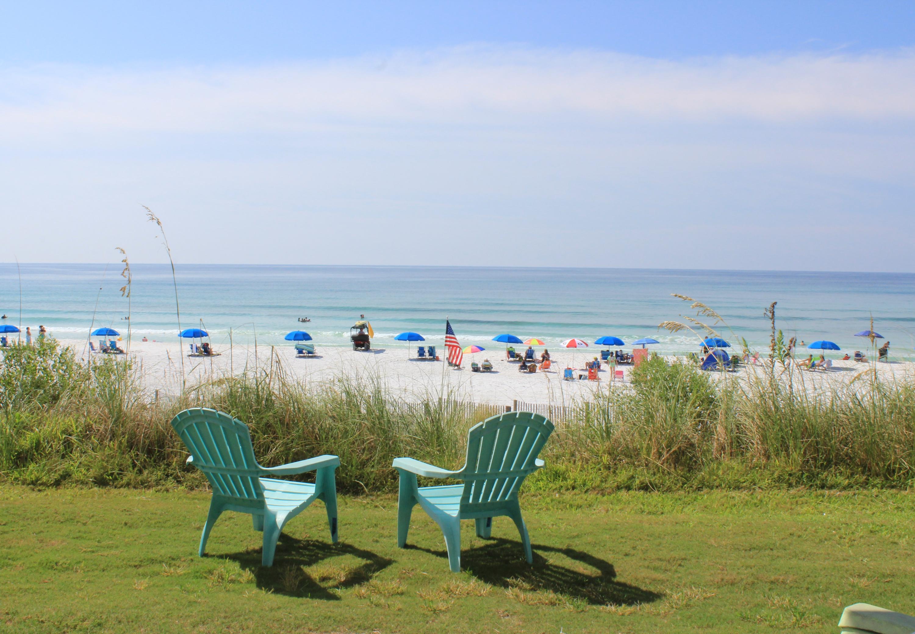 Spacious 3bd/2ba that sleeps 11, tiled throughout is a higher demand 1st floor unit with direct beach access from the patio off the living room is a beautiful income producing property. This popular rental grossed $73,000 - $80,000 in 2013, 2014, and 2015. Walk right out back door to the beach and enjoy gorgeous emerald water and white sandy views from the kitchen, dining, living, and master suite. Walk out the front door to the pool, hot tub, and sun deck for lounging. This unit does not feel like you are in a condo building because of the direct access to your unit from your vehicle in the front and the beach in the back. No elevators or stairs to haul luggage, groceries, and beach supplies to and from in this condo. Check out vrbo.com/10091reviews
