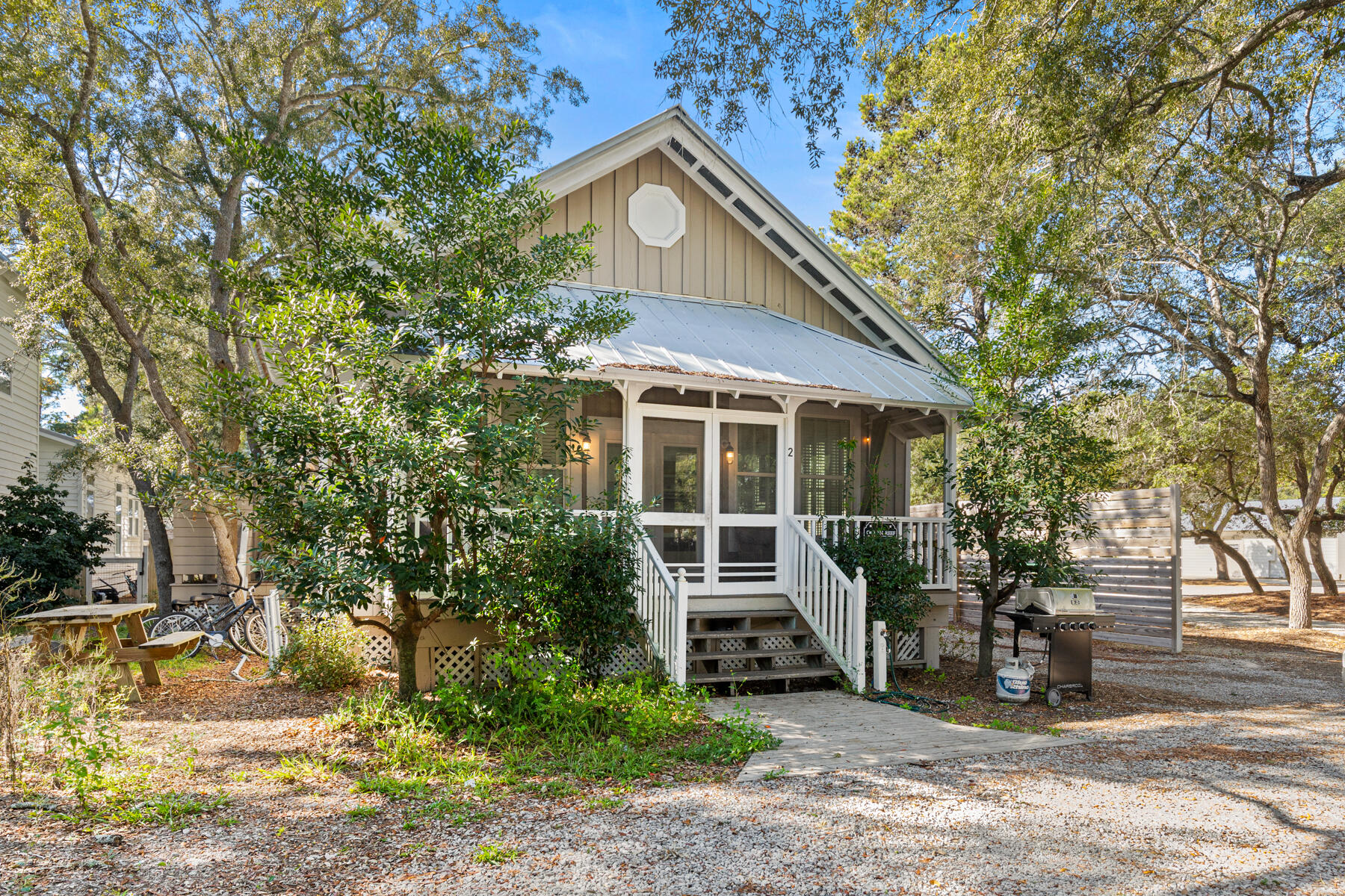 Charming Vintage Cottage & Carriage House in Historic Old Grayton Beach!
Welcome to Goodnight Moon and Bella Luna, a delightful vintage-style retreat tucked away in the heart of historic Old Grayton Beach. This one-of-a-kind property offers two beautifully appointed homes—each with its own distinctive charm and character.
Main Cottage:
•	3 Bedrooms | 3 Bathrooms | Sleeps 7
•	Thoughtfully designed with a blend of vintage elegance and modern comforts, the main cottage offers an inviting, spacious living area perfect for family gatherings. Enjoy cozy evenings and relax on the screened-in front porch as you people-watch and take in the quiet charm of this historic neighborhood.
Separate Carriage House:
•	2 Bedrooms | 2 Bathrooms | Sleeps 4 "	The separate carriage house offers additional privacy and space, making it perfect for guests, extended family, or even as a potential rental unit. It features the same vintage design and professional décor that complements the main cottage, with ample space for relaxation and comfort.
Outdoor Living:
"	The large front yard is shaded by majestic Oaks and Magnolia trees, providing a tranquil, natural setting. Enjoy al fresco dining or casual cookouts on the gas grill and picnic table. Whether you're sipping coffee on the porch or hosting a summer BBQ, the outdoor space is a perfect retreat.
"	Sold fully furnished and AS IS.
Location:
"	Situated just a short walk from the beach, and steps away from 15 fantastic restaurants, this home offers the best of both worldspeaceful privacy and proximity to the vibrant Old Grayton Beach community.
Additional Details:
"	All measurements are estimates, and buyers should verify any information they deem important.
Whether you're looking for a primary residence, a second home, or an investment opportunity, Goodnight Moon and Bella Luna is an absolute gem with timeless appeal. Don't miss your chance to own a piece of Old Grayton Beach's history.