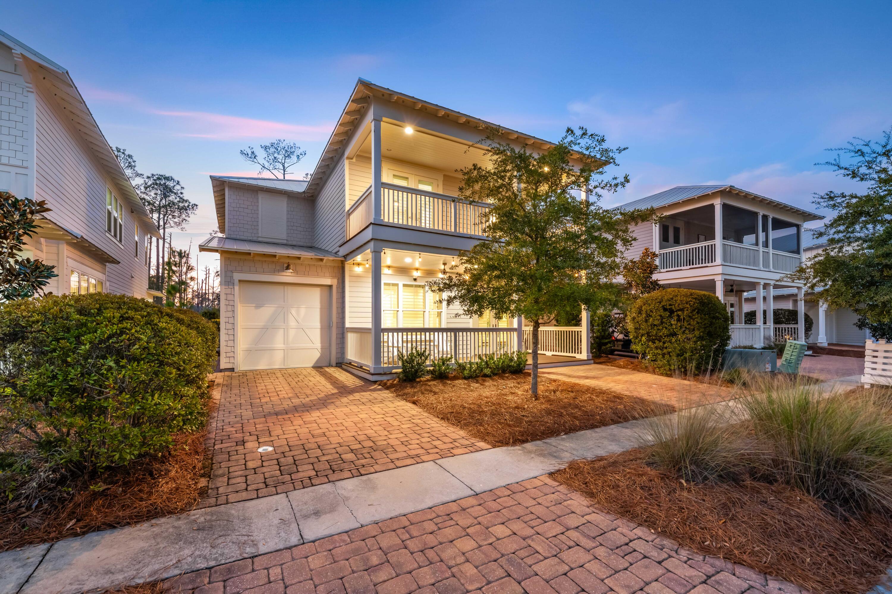 MOTIVATED SELLER! ACCEPTABLE OFFERS WELCOMED! Located in the highly desirable NatureWalk at Seagrove, this fully furnished 4-bedroom, 4.5-bath home backs directly onto a protected nature preserve, offering rare privacy and peaceful views. Designed for both comfort and versatility, the home features a main-level primary suite and en-suite baths in all bedrooms. Furnishings Included Enjoy coastal living with two balconies and approximately 800 square feet of covered porches, ideal for outdoor relaxation. The open kitchen is beautifully appointed with Shaker cabinetry, glass uppers, white sand quartz countertops, and a glass tile backsplash, complemented by light coastal gray wood flooring throughout.

NatureWalk offers outstanding amenities including a resort-style community pool and playground, and is ideally situated with two beach access points within a 1.25-mile walk or bike ride. Whether used as a primary residence, second home, or investment property, this home delivers the best of 30A living in a sought-after community.
