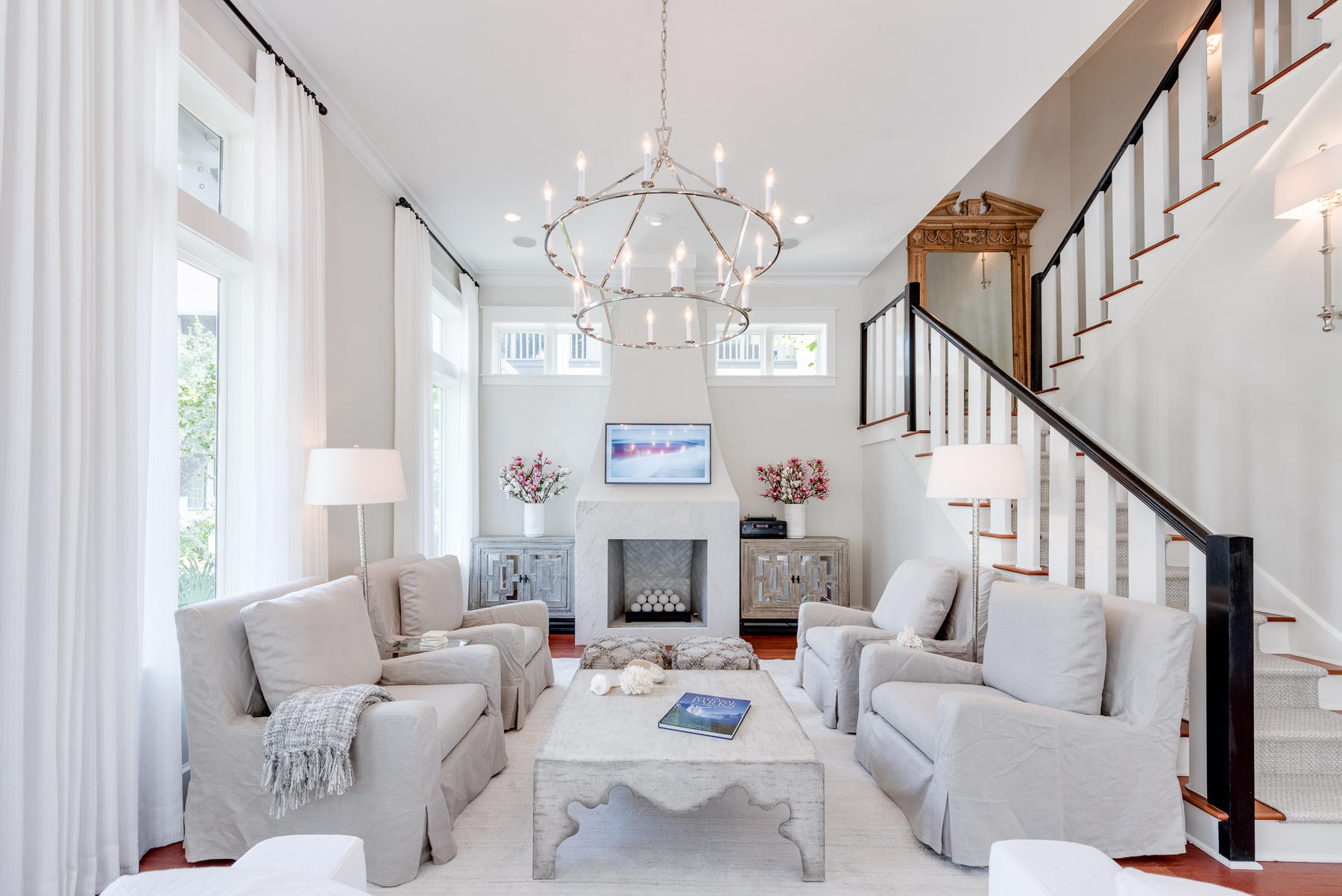 New to market in the heart of Rosemary Beach is this recently updated and elegantly designed coastal luxury! As you step into this home, the gorgeous design and modern decor are sure to wow. A grand light fixture in the living room makes a beautiful centerpiece, and the floor to ceiling fireplace beautifully anchors the room. The interior of the home abounds with stunning updates and luxurious furnishings. Designer lighting throughout compliments the modern coastal decor, and the large chef's kitchen with stainless steel top of the line appliances, and marble countertops, provides a amazing space for the whole family to gather. Dramatic windows flood the home with tons of natural light, and the high ceilings and ample square footage provide for an open and spacious interior. Stepping into the courtyard along a beautifully designed path of peacock pavers and large white tumbled stones, you are led you to the home's brand new private pool which completes the inviting outdoor space. Balconies can be found off of each bedroom, as well as a spacious front and back decks providing even more room to enjoy the outdoors. Continuing through the courtyard you find the cozy yet spacious carriage house situated atop the detached garage. Complete with a kingsize bed, kitchenette and bathroom, it is the perfect space for your guest to have their own private getaway.

Buyer is responsible for personally verifying details about this property. Any information contained in this listing is believed to be accurate but is not guaranteed.