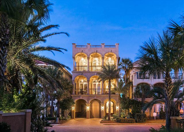 Every detail of Vista Del Mar was carefully selected and masterfully designed to encapsulate the opulent beach life.
From granite counter tops in both laundry rooms to breathtaking views from the 4th floor observation deck every inch of this home well thought out.
The first floor of Vista Del Mar has a bunkroom and a master bedroom both with walk in closets and full baths.
The second floor of the home is where the grand entertainment begins. The dramatic focal point on the second floor is the top-of-the-line chef's kitchen. The kitchen is equipped with Viking appliances to include a wine cooler tucked into the oversized center island that seats 6 comfortably. The formal dining area has another 6 chairs under the chandelier. The living room and game area are funished with a gas fire place, surround sound and 3 sets of doors to showcase the gulf views.  The second floor is also where you will find a home office with built ins and a 1/2 bath.
The 3rd floor has 2 master bedrooms and a laundry room. Both master bedrooms have oversized walk in closets and surround sound. The master suite has its own his and hers vanities, jacuzzi tub and a private seating area in front of the fire place. The master suite also has a private balcony with stunning views of the Gulf of Mexico. 
When you reach the top of the house, either by elevator or the stone steps, you will then realize why Vista Del Mar has the most beautiful views. 2000 sq ft of outdoor living space to provide the maximum amount of relaxation.  The roof top is equipped with a gas grill, mini fridge, ice maker and sink. The 360 views from the roof top are truly unparalleled.