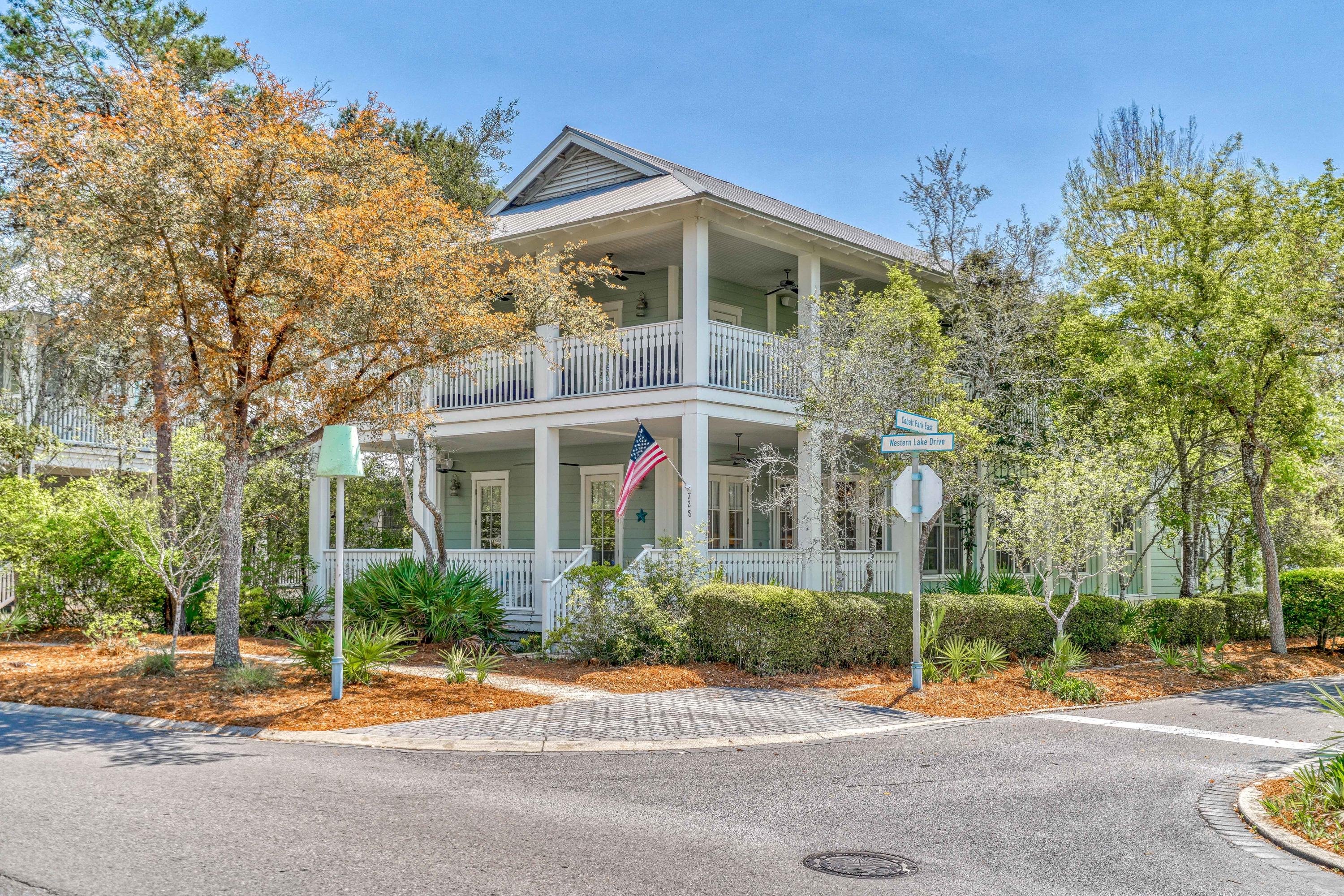 Stunning Watercolor home on Large Corner Lot designed by TS Adams Studio located just steps to the Watercolor Beach Club, Town Center and the back entrance of Seaside. This home features over 1,700 sqft of wrap around porches, an oversized two car garage with extra storage space, a beautiful carriage house with separate living room and bedroom, an outdoor shower and more. There is a master bedroom on the main floor with secondary master upstairs equipped with a private screened balcony. Spacious open floor plan on the main level with an additional living area upstairs. There are beautiful hardwood floors throughout, high ceilings and a gourmet kitchen with large island and gas grill. Rental Machine and sleeps 14 comfortably. Room for a pool with renderings and estimates available. Rental Projections up to $167k without pool and $192k with pool.