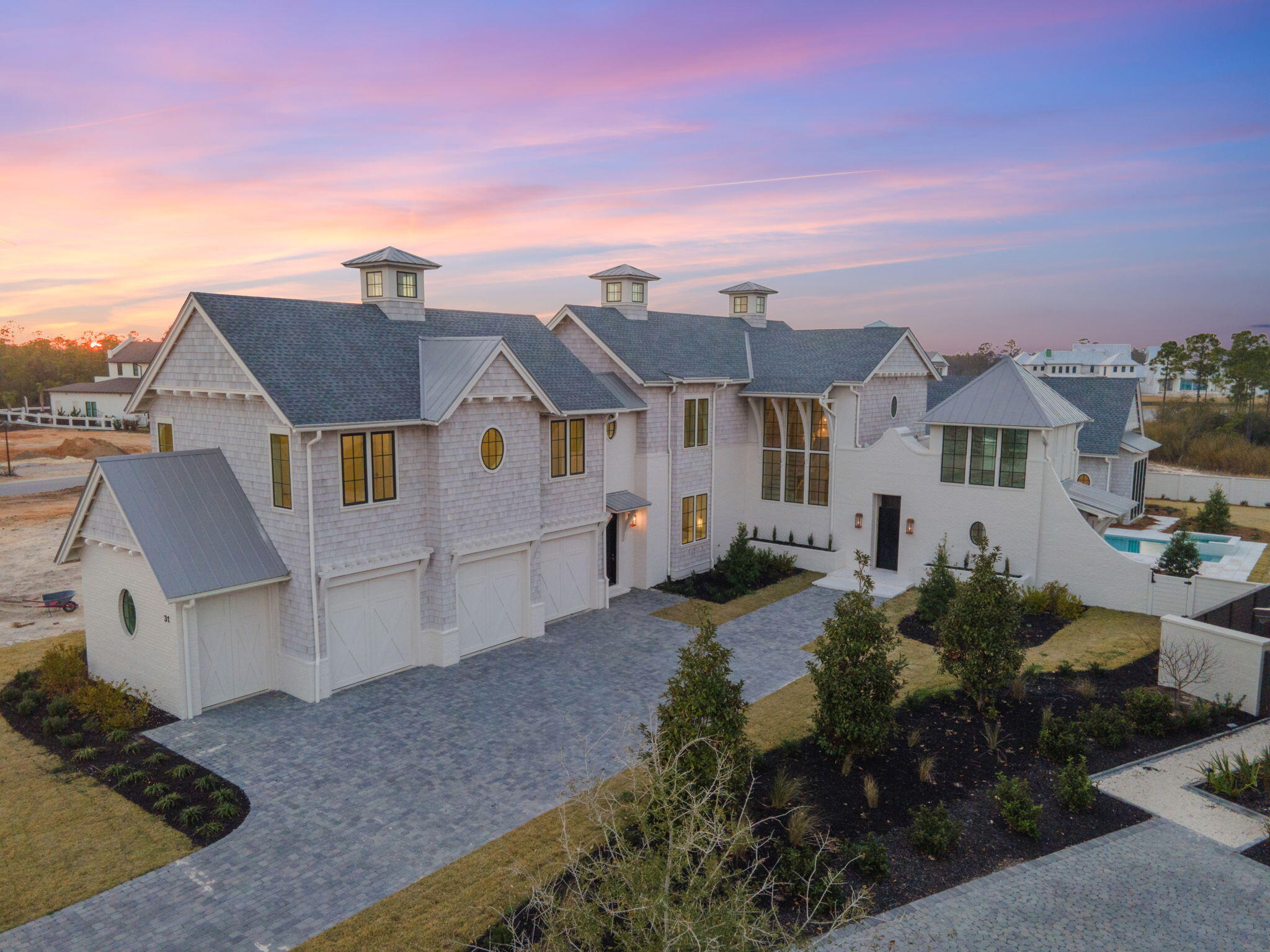 Presenting an unparalleled gem of luxury living in the esteemed Watersound Camp Creek, this brand new construction is poised to redefine opulence. Boasting 5 bedrooms, 7 bathrooms, and an expansive 6,221 square feet of meticulously crafted living space, this residence is the epitome of sophistication. A grand foyer welcomes you into a chef-style kitchen adorned with top-of-the-line countertops, custom-built cabinets, and high-end appliances, seamlessly flowing into a meticulously designed main living space and dining area featuring custom decor. Soaring high ceilings, generously-proportioned windows and balconies, as well as unexpectedly open exposures in four directions enhance the sun-flooded and bright nature of the residence. The first floor opens to over 1,000 square feet of outdoor bliss, complete with a terrace, resort-style pool, and pool cabana- a haven for entertainment. The master suite, situated for utmost privacy, offers exquisite lighting, expansive windows, a spa-like bathroom, and an oversized walk-in closet. Fantastically reimagined and with an eye to the 30A lifestyle, this residence's bold and impeccable presentation elegantly marries its classic and gracious design with the best of both worlds. This entertainer's dream includes a three-car garage, golf cart garage, and a spacious motor court. The second-floor houses three additional en-suite bedrooms with walk-in closets, a bonus room, and porches with stunning views. Nestled in a brand-new neighborhood, this custom-built haven emanates upscale allure, inviting you to experience luxury living near the sugar sand beaches of 30A. Drive through today to witness the embodiment of exclusivity and sophistication in this extraordinary community. Your dream home awaits a harmonious blend of elegance, comfort, and coastal charm.** All information & dimensions within this listing to be verified by the Buyer.**