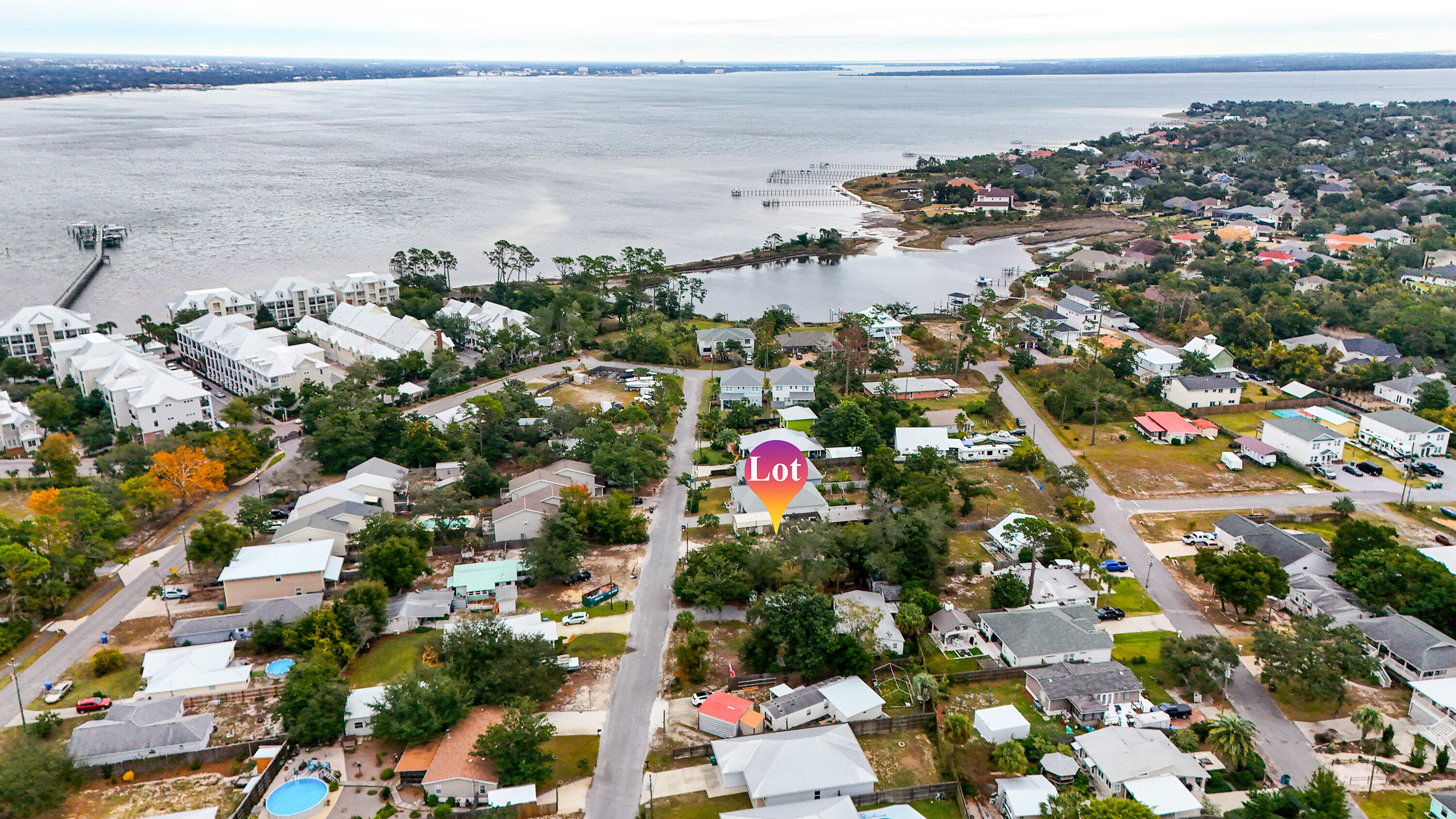 Buildable Double Lot - Steps to the Water!

Opportunity knocks... and this one is loud. Just one block off the water, this oversized double lot offers flexibility that's almost impossible to find in this part of Panama City Beach. Build two homes for maximum investment potential, or spread out and create one custom coastal dream home with room for everything you've ever pictured.

Located just down the road from The Preserve on the Bay and Bay Point, you'll enjoy the convenience of premier neighborhoods—without the HOA fees. That's right... freedom to build what you want, how you want it.

A two-story home on this property can capture peek-a-boo water views from the upper level, giving you that daily ''pinch-me'' moment. Even better, the lot sits in Flood Zone X, meaning no flood insurance requirementa rare win this close to the coast.

Whether you're a builder, investor, or someone ready to design your forever beach retreat, this location simply can't be beat.