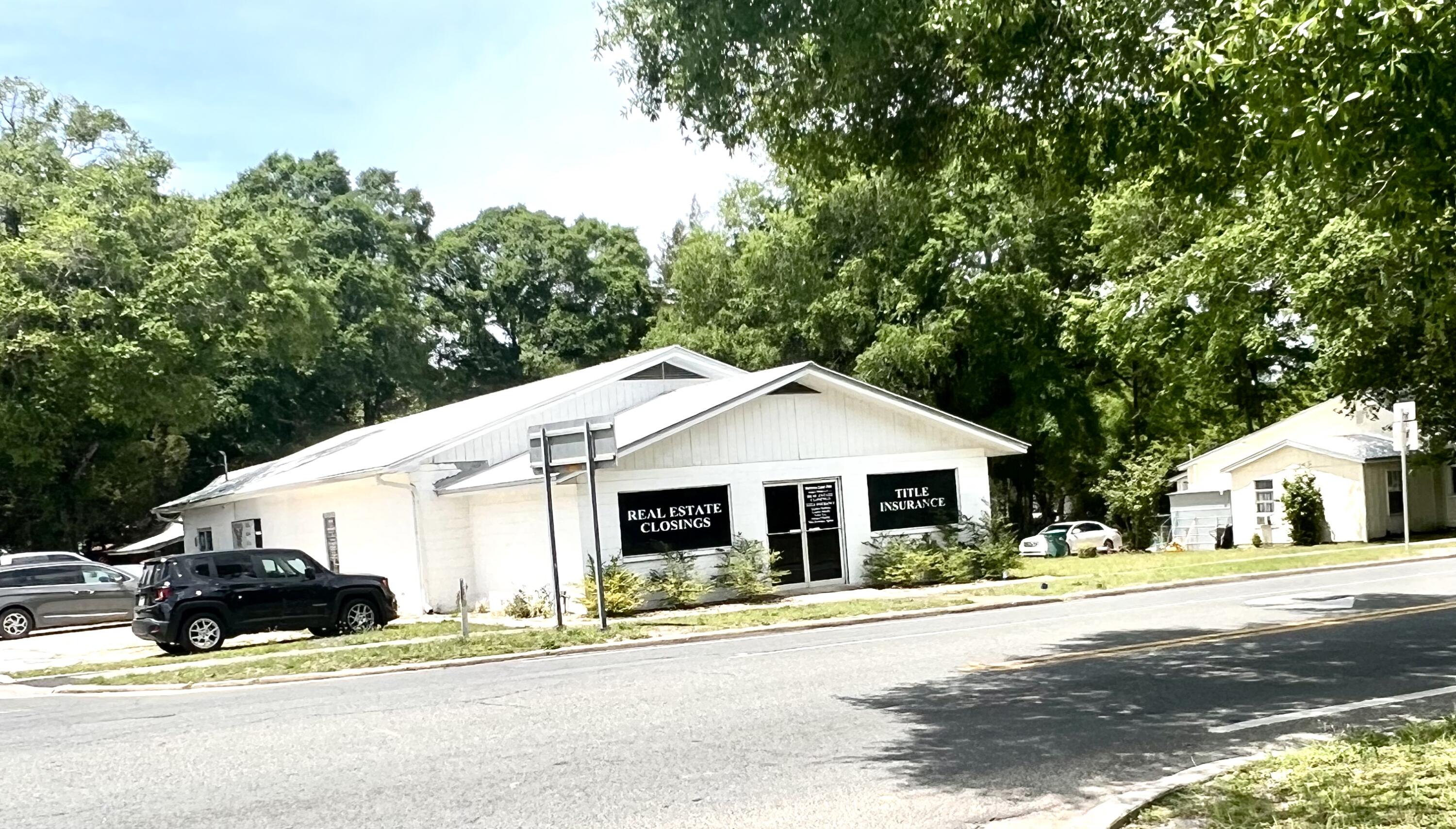 Perfect Commercial Location!  This 3344 s.f. block building with silver metal roof has the possibility of 3 rental units within, or you can use the entire building for your business.  It has 3 phase electric at the pole if needed. 
City water and sewer.  Separate heat pumps to each unit. Floor plan is suitable for a doctor's office, business office, lab, plenty of plumbing in place for a nail shop or spa.  Includes a full kitchen with dishwasher and stackable washer/dryer room, 3 bathrooms, file room, 10+ office spaces, 2 conference areas that could be used as triage area for a doctor or lab.  Average daily traffic is 9,500 vehicles. Centrally located to the town, just 1 block over from Nelson Ave (Hwy 90)  and the Historical area-DeFuniak Springs, FL.  Great visibility!