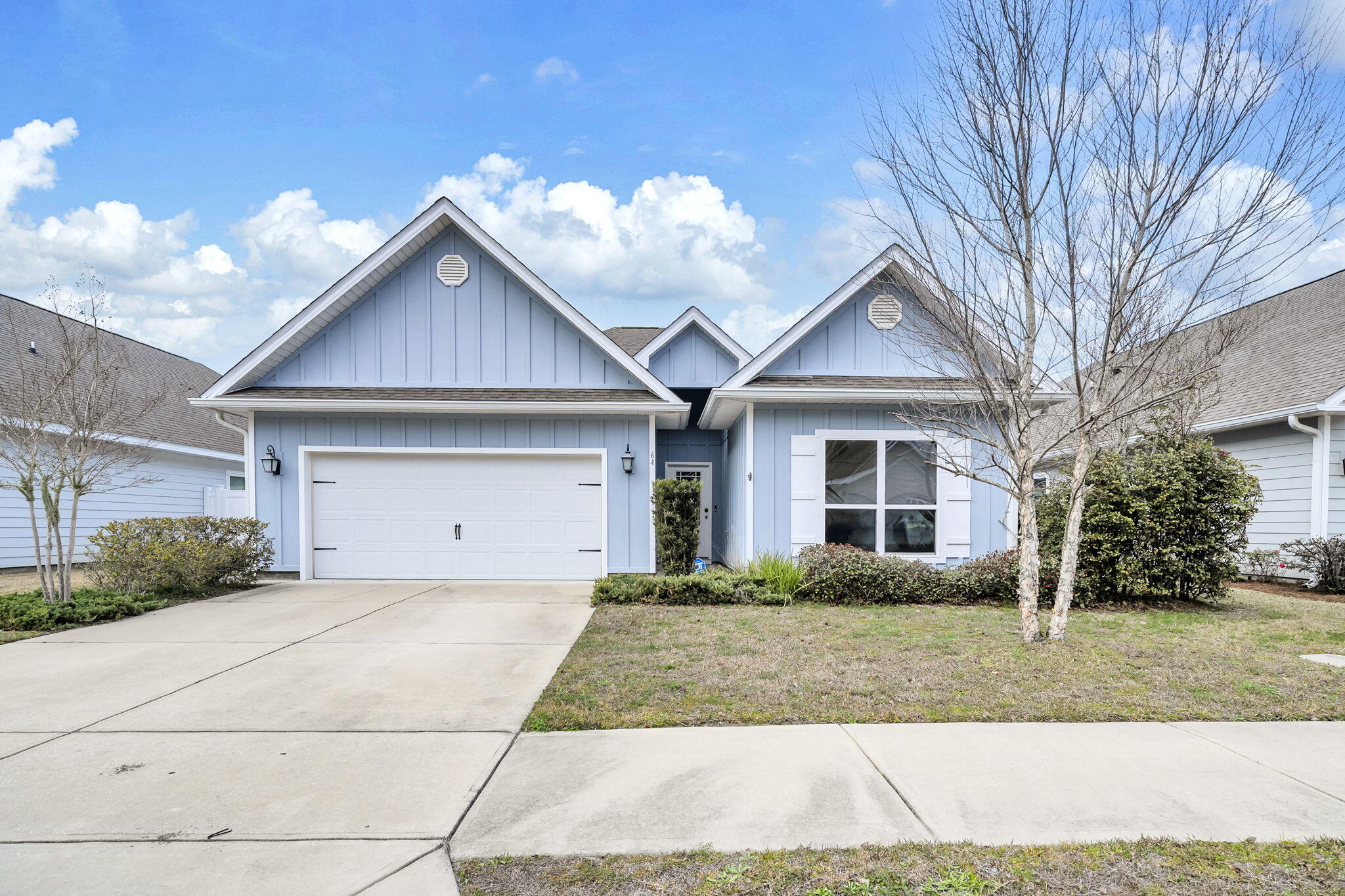 ASSUMABLE MORTGAGE RATE OF 3.25% AVAILABLE! Newer-Built 4-bedroom, 3-bath Home featuring a rare Attached Related-Living Suite with Private Entrance and Room to Build a Pool! This hard-to-find layout is no longer being built in the area!  It is Ideal for Out of Town Guests, Relatives, Investors, or EVEN Great for Generating Rental Income to Offset your Expenses! The related living space offers its own kitchen, living room, bedroom, laundry, and private outdoor area, creating true separation and flexibility. The main home and suite together boast 2 Beautiful White Kitchens with Light Granite Countertops, EVP Flooring, and 2 Sets of Stainless Kitchen Appliances. The Spacious Primary Suite features an Ensuite with Soaker Tub, Tiled Shower, Double-Bowl Vanity, and WICloset.  Additional Features include Smart Home System with an Alarm Panel, Whole House Water Filtration System, a 2-car Garage with Built-Ins and Attic Storage, Sprinkler System, Gutters, and a Private, Fenced in Backyard.  Located just over 5 minutes from 30A, Beach Access, Dining, Shopping and More!