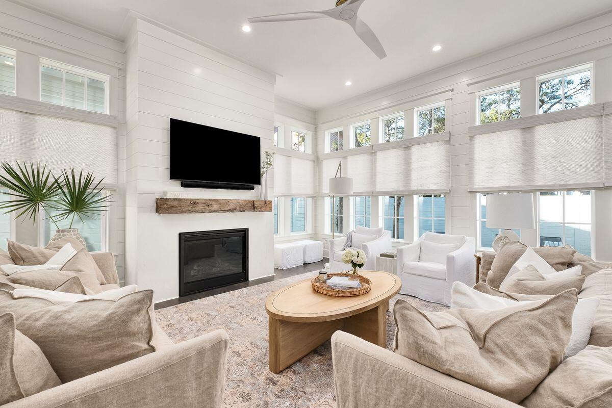 Welcome to 28 Cypress Hill, a stunning new construction home nestled in the desirable neighborhood of Old Seagrove, adjacent to Seaside. This architectural masterpiece, designed by TS Adams and built by Ryan Harp Construction, offers the perfect blend of elegance, luxury, and coastal charm.
Spanning across three spacious floors, this remarkable residence boasts a total of 7 bedrooms, including two primary suites thoughtfully located on the first and second floors. Additionally, two bunk rooms, 8 full baths, and 2 half baths ensure ample space and comfort for all guests.
As you enter the home, you'll be greeted by an open and airy floor plan, featuring a generous great room adorned with shiplap walls and a cozy fireplace. The dining area seamlessly flows into the well-appointed kitchen, complete with top-of-the-line Thermador appliances, a 48" gas range, quartz countertops, and a custom tile backsplash.
Step outside onto the screened-in porch, a true oasis for outdoor living. With a fireplace, a summer kitchen, and captivating views of the outdoor pool area, this space invites you to unwind and entertain in style. The heated saltwater pool and lounge chair area offer the perfect setting for relaxation and enjoyment.
Venture up to the second floor, where you'll find four bedrooms, a bunk room, and a flexible living area designed for relaxation and entertainment. The third floor presents two additional bedrooms (including one bunk room) providing ample accommodations for large groups or extended families.
For the ultimate vantage point, ride the 4-stop elevator up to the magnificent fourth-floor terrace. From this elevated retreat, you'll be treated to breathtaking panoramic views of Seaside and the sparkling Gulf of Mexico. The indoor/outdoor space and comfortable loungers create an ideal setting to savor stunning sunsets and create lasting memories.
This exceptional home is further enhanced by multiple laundry rooms, a 2-car garage, an outdoor shower bath area, hardwood floors, custom tile, and exquisite wood accents, including reclaimed beams, adding character and warmth throughout.
With its generous sleeping capacity of 20+, this property presents an incredible investment opportunity, with rental projections exceeding $378,000+. Notably, there are no HOA fees, allowing you to fully immerse yourself in the coveted Old Seagrove and Seaside Florida lifestyle.
Don't miss the chance to own this luxurious coastal retreat, where impeccable design meets unparalleled comfort. Schedule your private showing today and embrace the coastal living experience at 28 Cypress Hill!  Be certain to ask for list of exclusions