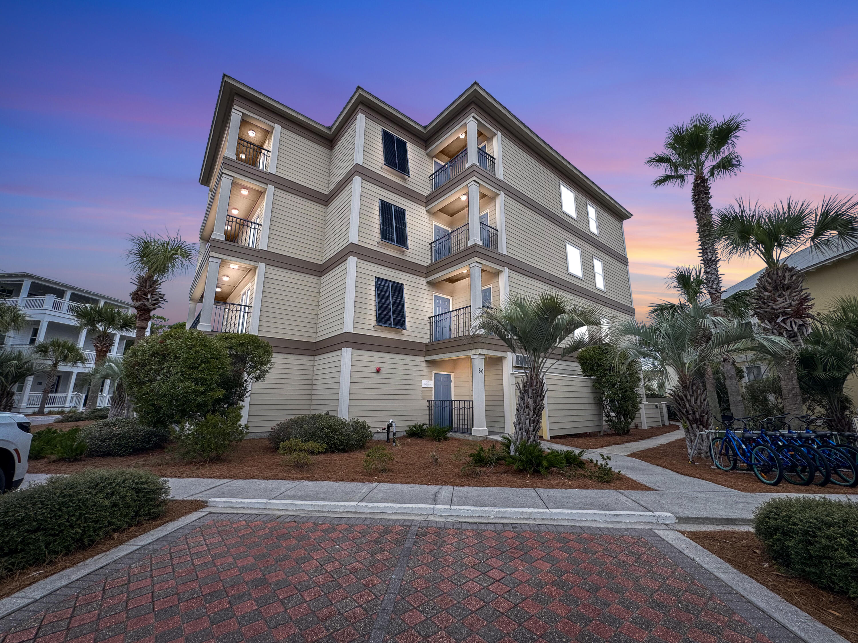 One of only four residences in boutique Sable Pointe West overlooking the 12,000-sq-ft lagoon pool, the largest on 30A. This fully reimagined 4BR/4BA Seacrest Beach condominium offers privacy, views, and effortless coastal living just steps from the beach, with optional tram service. The open living and dining areas flow to an expansive covered terrace overlooking the water features below, while two additional balconies create private outdoor retreats. The kitchen features custom white cabinetry and stainless appliances designed for easy entertaining. Two primary suites with spa-style baths. Proven short-term rental with $115,000 gross revenue in 2025. Walk to dining, boutiques, and the Rosemary/Alys Beach areas. Sable Pointe West is an intimate luxury building in Seacrest Beach community of only four residences, each occupying its own floor with private elevator access. The beach is moments away, with optional tram service, and the home sits within effortless walking distance of boutiques, dining, and the Seacrest/Rosemary/Alys Beach corridor.