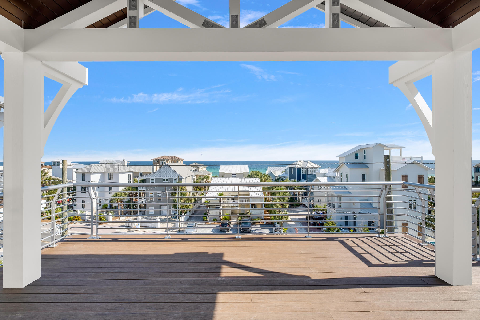 Located in the heart of Seagrove, just a few steps from the Emerald Coast's famous sugar white sand beaches and less than one mile from Seaside, 3345 East County Highway 30A combines stunning high-end finishes with commercial-grade structural soundness. This home contains nearly 6,000 square feet of heated/cooled space and boasts four stories (each with 10-foot ceilings), all connected by a stunning floating staircase. Each of the first three levels contains an open-concept common room and oversized outdoor porch, with exceptional Gulf views from the third and fourth levels. All seven bedrooms, three of which offer custom built-in bunks and two of which are master suites, come with en-suite bathrooms, and two great rooms have powder rooms. The house comes fully furnished and is meticulously finished with genuine pecky cypress beams and ceilings throughout, quartz countertops, marble tile, high-end engineered plank floors, floating stairs, custom cabinets, and top-of-the-line appliances.

The interior of the home is complemented by unmatched attention to detail on the exterior: oversized porch spaces on each level, highlighted by a large sun deck on the fourth story framed by cypress trusses; an oversized pool / hot tub combination off the front of the house, made complete with lights and a custom waterfall feature, an outdoor grill area, and walled in by a brick and masonry fence to match the brick/masonry exterior of each home's first two stories; paver driveway and parking to the rear; and custom landscaping.

Despite their standard-setting luxury finishes, arguably the most impressive aspect of this home is what the eye can't see: their structural soundness. Master builder Mike Stinson, who was the chief operator at Yates Construction for over two decades, constructed these homes with commercial-grade materials and concepts. From foundation to rooftop, Stinson's deep background in commercial and industrial construction is evident in these homes, with each designed to withstand ultra-severe weather. Simply put, these are the best-built homes in Seagrove.

From an investment perspective, the home is on pace to produce annual gross rental revenue of more than $350K. When compared to their price points, the resulting investment profile is among the best along the 30A corridor.

Every aspect of this home (proximity to the beach and to local dining/shopping, luxury finishes, commercial-level engineering, Gulf views, and ROI profile) is market-leading. Come see for yourself!
