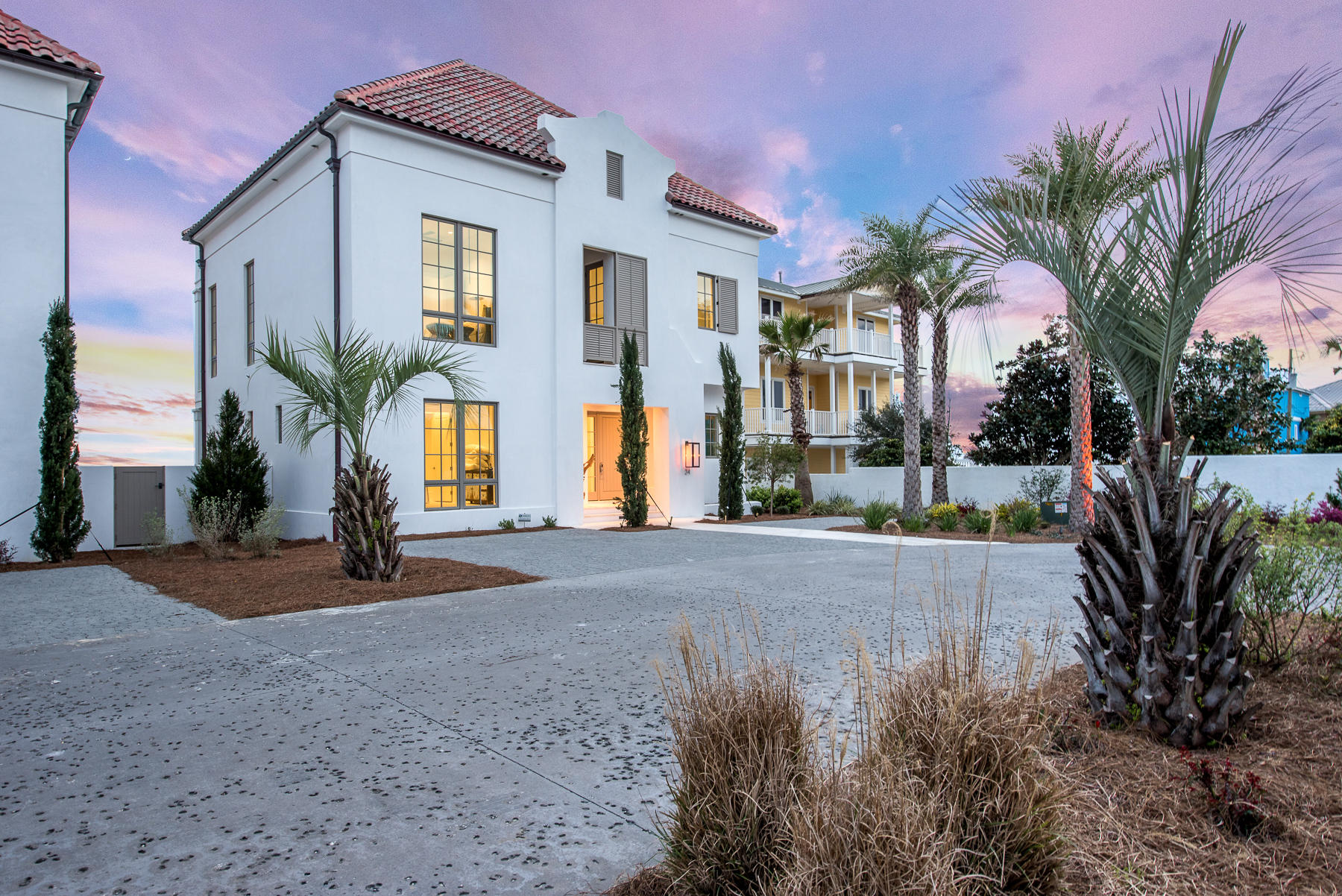 BRAND NEW LUXURIOUS GULF FRONT home in exclusive Escape community of Inlet Beach. The private gated 4 home community of Escape holds only Gulf front homes of exceptional quality. Built with fortified construction and highest energy efficiency standards, and designed by A Boheme Design of Rosemary Beach, this waterfront home is comprised of only top-of-the-line materials and finishes. Subzero and Wolf appliances fill the chef's kitchen, and you'll find all stone and brushed wood flooring throughout. The unsurpassed views of the Gulf can be enjoyed from each of the homes 3 levels. The third level exclusively holds the master suite, oversized master bath and closet with laundry facilities, and a private balcony.The second level boasts gorgeous 14' ceilings and houses the main living areas including the kitchen with oversized island, living room, and an additional bedroom and bath. The home's gulf side balcony runs the width of the home, and just off the kitchen you will find a separate a grilling porch. The first level of the home has a 2nd Gulf front master bedroom and 2 additional bedrooms all with en suite baths. Each floor holds it's own laundry facilities for ultimate convenience. You will have private gated beach access, a private parking garage, and 1/4 ownership of the gorgeous and unique rooftop pool, outdoor kitchen and indoor/outdoor common areas. 
All information is deemed to be accurate but is not guaranteed. Buyer to verify.