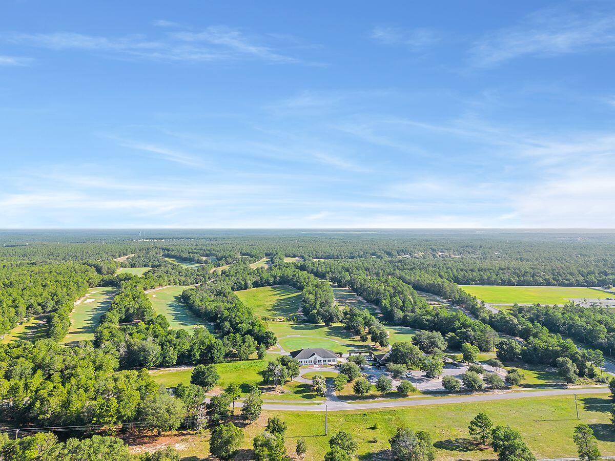 Welcome to the future of amenitized living in Walton County, an exciting new development opportunity, anchored by the renowned Blackstone Golf Club. This exclusive offering spans an expansive 1373+/- acres of prime, developable land, creating a breathtaking canvas for a visionary investor seeking to create an exceptional residential haven. The centerpiece of this extraordinary property is, of course, the established Blackstone Golf Club. With its championship-inspired course, well-maintained greens and fairways, this future lifestyle oasis crafts endless opportunities for a savvy developer or investor. As the sun sets over the lush landscape, future residents will find solace and camaraderie within the club's existing amenities, which include a clubhouse, pro shop, restaurant and bar. Moreover, the verdant expanse surrounding the club presents an ideal opportunity for adding even more club-level amenities, ensuring that the living experience here is truly second to none. With an active planned unit development approval in place, the future buyer has the unique advantage of a nearly immediate start to build out the impressive 750 approved homesites. Crafted to harmoniously blend with the natural beauty of the area, these homesites offer an unparalleled range of possibilities for crafting a variety of residential offerings that capture the essence of refined living. From spacious homesites nestled among mature trees to estate lots overlooking the golf course, each homeowner will find themselves immersed in a sanctuary of comfort and reprise. At the heart of this development, city water awaits to provide an uninterrupted flow of this precious resource to each homesite. And, while septic systems are currently approved, the presence of a nearby county sewer plant opens up further opportunities for enhanced convenience and environmental stewardship.