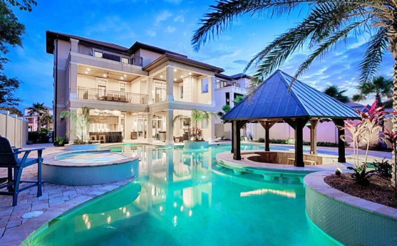 Welcome to Splash!  This vacation rental is an investor's dream come true, being one of the best (if not THE best) renting properties anywhere.  As of today, the 2022 bookings are already over $600K....which is the base rent only.  It already has over $70K booked for 2023!  In addition to the rent, a substantial amount of additional income is generated by ancillary fees and services.  Boasting the largest private, resort-style pool in Destin, it has another unique asset which almost no other home in the area can offer.  As it is PERMANENTLY grandfathered by the Bert Harris act, it is not subject to the restrictive occupancy & parking ordinances recently imposed by the City of Destin (please see the attached document).  Most other rental homes which have achieved this status, are only grandfathered for 5 years....with only 2-3 years remaining.  This one is forever, guaranteeing continued higher revenue in the future.  Sleeping 34 people, it's ideal for large reunions, weddings, parties, retreats and such.  Splash also offers a beautiful outdoor kitchen & fireplace, 3 full-size washers & dryers, numerous refrigerators & ice machines, a huge open living area with lots of room for dining, 7 balconies, a sunken bar in the pool (with 12 underwater chairs), huge garage, game room and a 4th story rooftop deck so you can enjoy sunset every day.  The home is just steps to the beach, walking distance to restaurants and close to shopping, golf, dining and all activities our beautiful paradise has to offer!

Because the owners have decided to voluntarily make some improvements and upgrades (for example, adding a roof to the third floor balcony, decorative tile work in the outdoor kitchen and changing some stone work around the pool), they are NOT PERMITTING SHOWINGS UNTIL COMPLETION on February 8th.  You may submit an offer contingent upon a personal inspection.  Proof of funds must accompany any offers and a CRSP-16 is preferred.