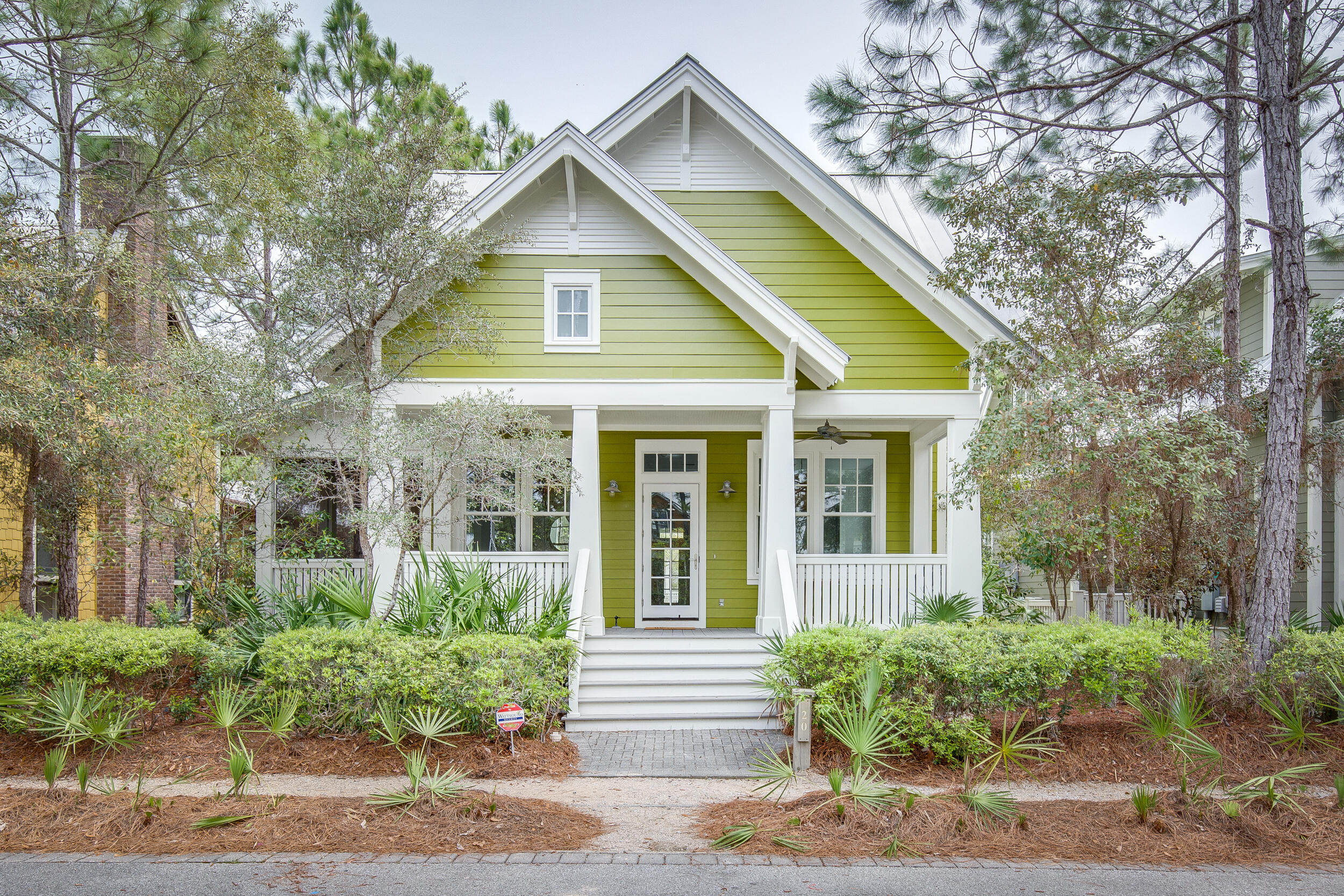 This charming Florida Cottage is located in Watercolor Phase II.  Upon arriving, you are welcomed by an inviting front porch overlooking a quite cul-de-sac and manicured park. Upon entering the home you will find an open floor plan, a recently renovated kitchen, a living area, dining area, hardwood flooring, breakfast bar and an additional screened porch off the dining room. 
The Master Bedroom is located on the first floor along with a second bedroom.  Another bedroom and 2 bunk rooms add beds and space on the second floor. Each of the bedrooms and the bunk room have their own bathrooms.  This home has seen recent renovations in the kitchen and bathrooms adding to the southern charm found in in this special home. This home is a must see!
