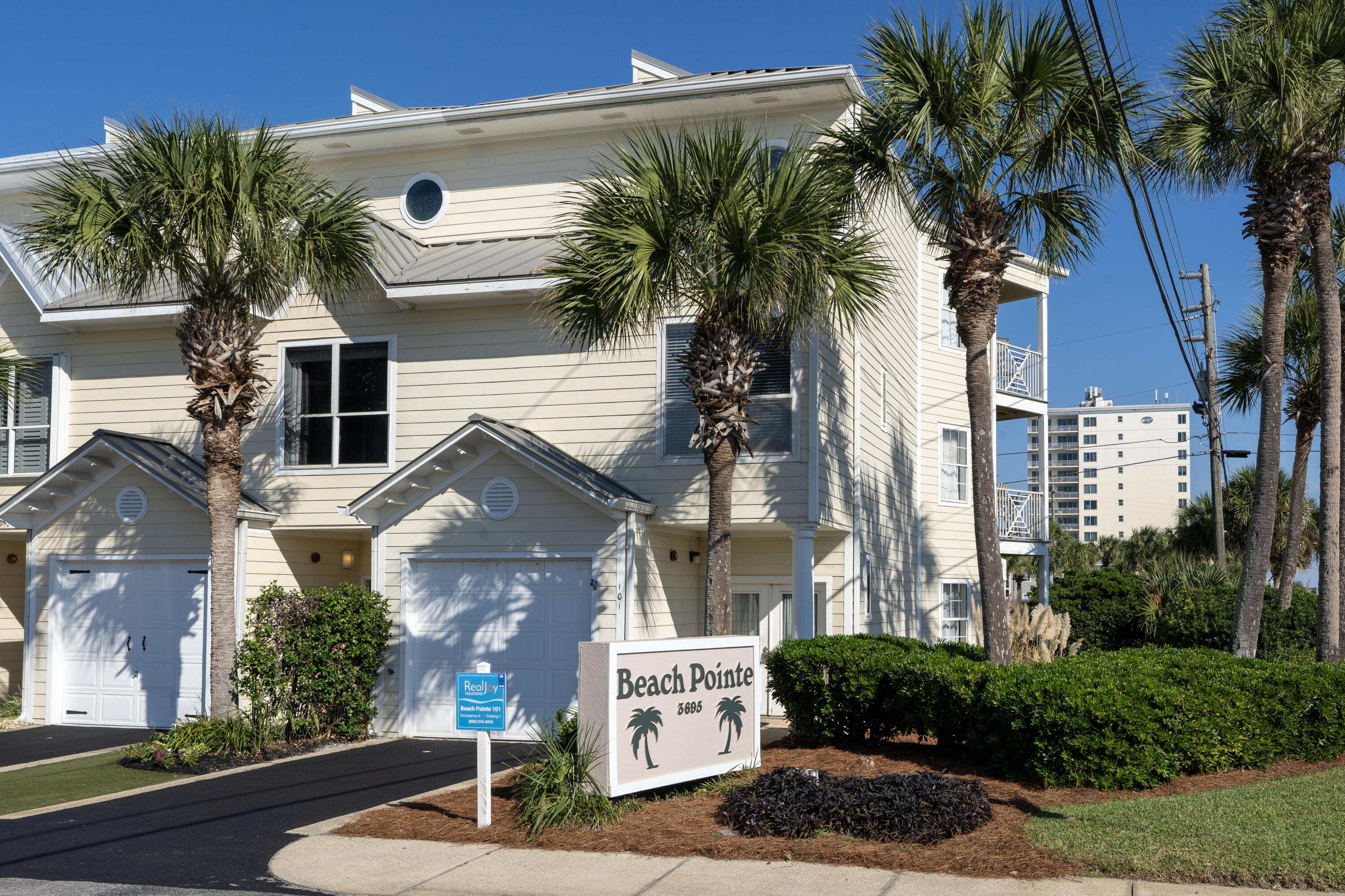 COME SEE THIS UNIT TODAY 12/20/25 BEFORE IT'S RENTED DURING SNOWBIRD SEASON THROUGH FEBRUARY!   Directly across the street from 230 feet of deeded private beach access!  This is a  gulf view & end unit townhome with the view facing east  providing unobstructed views of the Gulf of Mexico  and sunrises every morning . Directly across the street from the gate and deeded beach access for Beach Pointe homeowners and guest.  
Unobstructed  gulf view from second and third floor balconies and also from inside the second floor living room, kitchen/dining. There is one bedroom and full bathroom on each floor. The first floor bedroom has access to back patio and green space.  Entire 3rd floor is the large master suite with the master bedroom porch facing east waking up to some of the prettiest sunrises on the beach.   1 car garage. LVT flooring throughout the home 4 yrs old. 3rd floor air conditioner 2 years old. Newly painted walls, cabinets and stair case. New light fixtures.  This unit has been on the vacation rental program for 15 years and has many repeat guest who come every year.