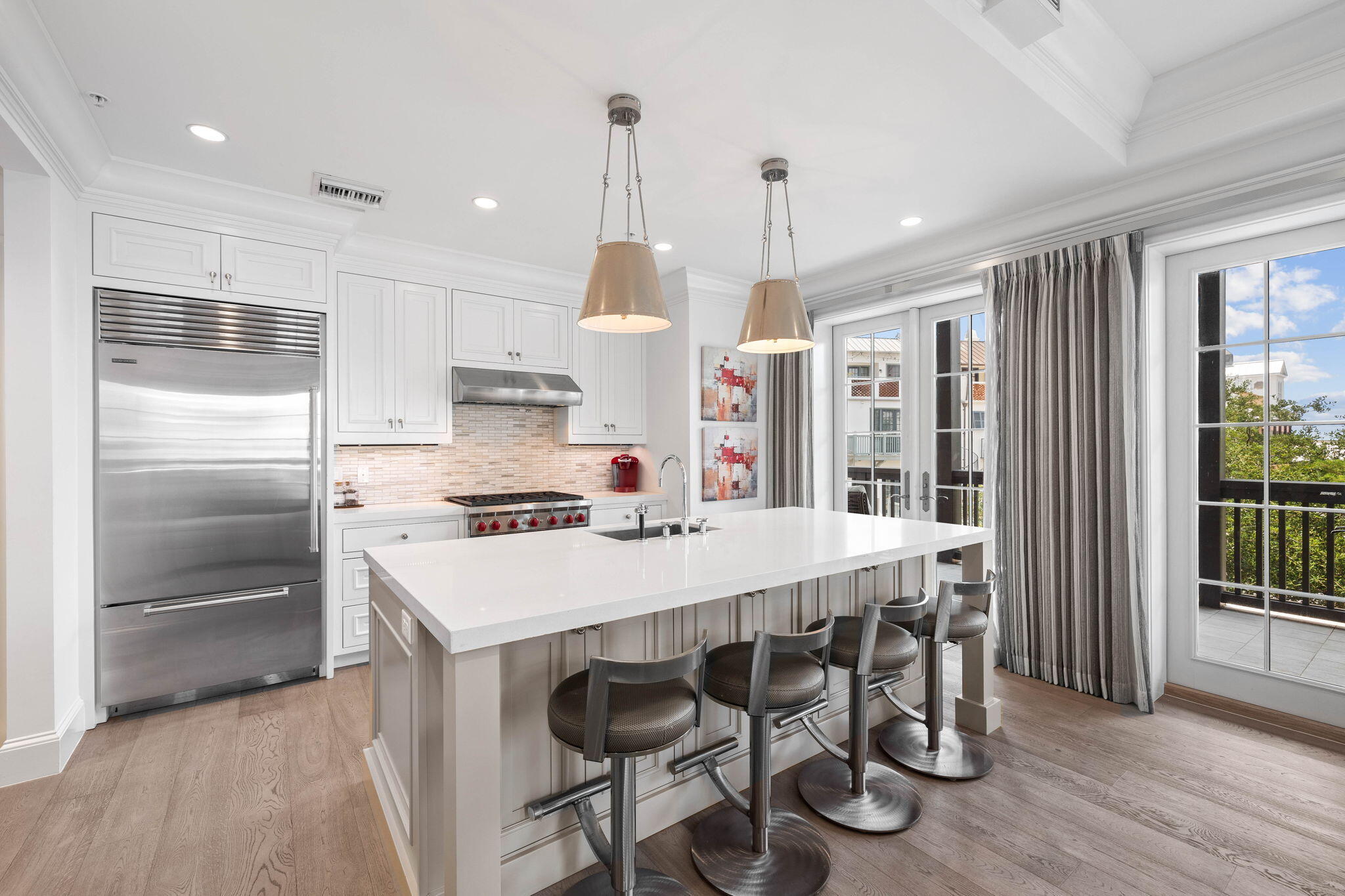 *Active listing, off market until 1/30* This Rosemary Beach luxury condo, with a view of the Gulf, sleeps six. It is located in the heart of Rosemary Beach and south of 30-a, adjacent to Town Hall. The Orleans is newer built and has a coastal modern design. Unit 2C has a large wraparound balcony that faces south and offers a view of the gulf. This professionally designed residence has 2 King bedrooms, each with private baths. Two twin bunks in a hallway alcove have access to a third full bath. The Orleans is a fusion of style and luxury, and is convenient to boardwalk G or H. Cappoli Interiors of Palm Springs blended a traditional coastal design with modern lines. The lobby's crisp, white walls serve as a canvas showcasing Trowbridge prints accented by wrought iron and wood details