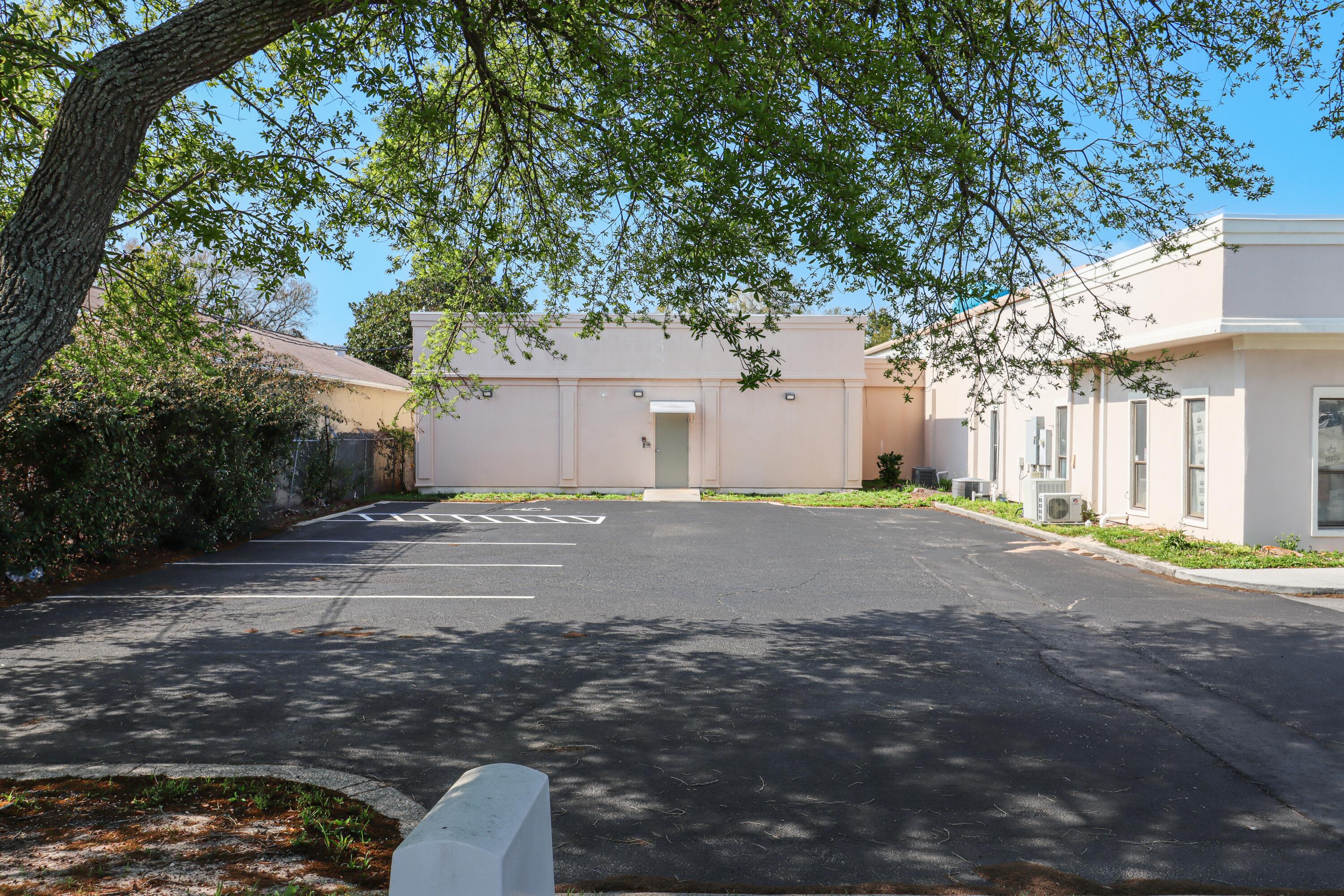 Now available For Sale or Lease, 185 Stahlman Avenue A is a ±4,060 SF office and warehouse facility perfectly positioned for an owner-user or investor in the heart of Destin. Constructed in 1998 with durable concrete block, this asset offers a versatile layout designed to support high-demand business operations. The interior features four private offices, an open workspace, and a breakroom, alongside two specialized server rooms. These tech-ready spaces include elevated, removable flooring for efficient cable management and airflow, making the property uniquely suited for technology, telecom, or data-driven users. The warehouse component provides functional logistics with a dock-high loading position and approximately 12-foot clear height, ideal for storage or light industrial use. For businesses requiring significant power and reliability, the building is equipped with three-phase, 1,000-amp electrical capacity and a dedicated backup generator. Strategically located at the west end of the Azalea and Mountain Drive commercial corridor, the property sits less than a quarter-mile from Hwy 98 and Destin's harbor and entertainment district, offering convenient access, strong surrounding amenities, and proximity to one of the area's most active commercial and tourism hubs.