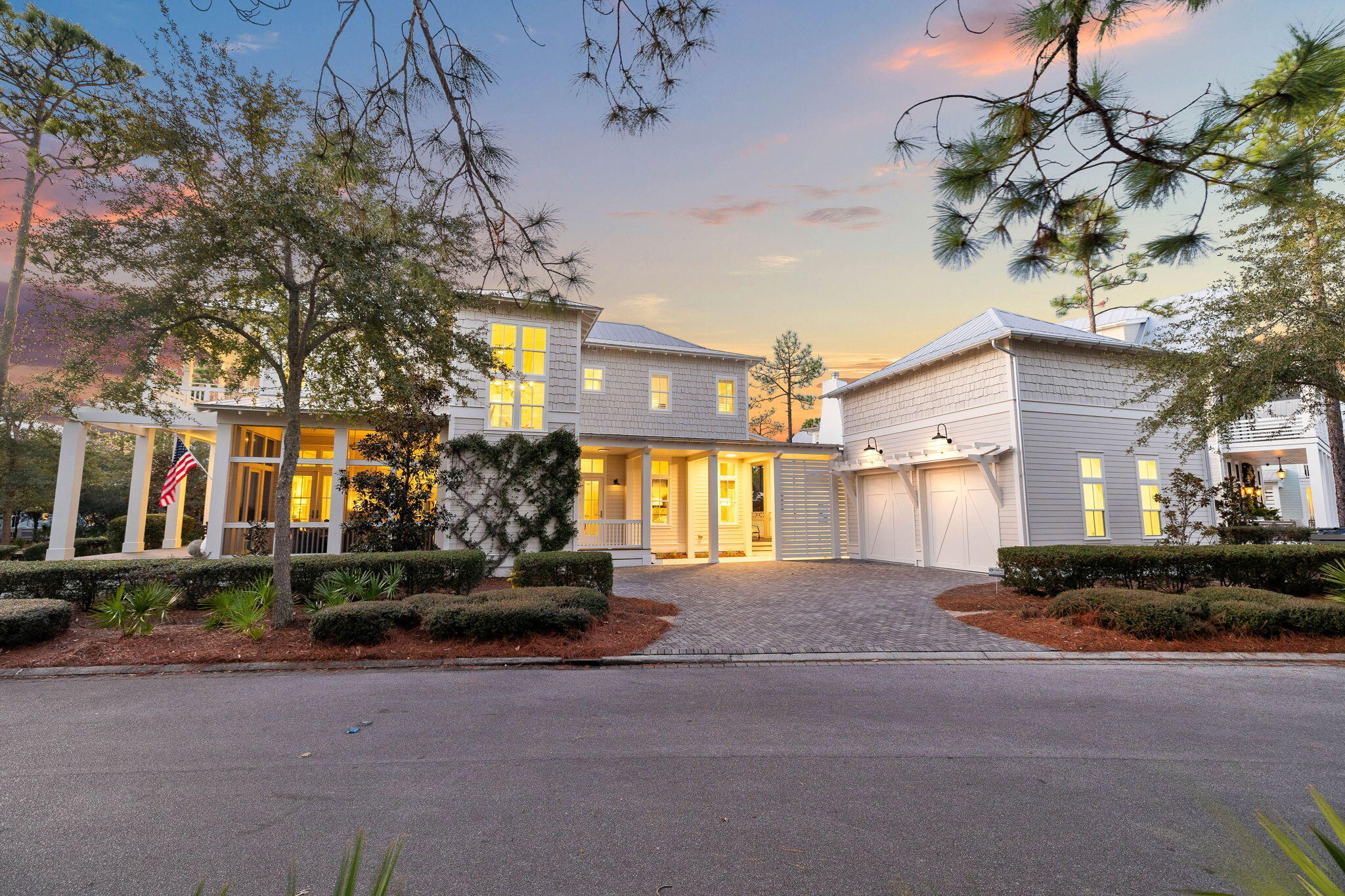 Welcome to this beautifully appointed 5-bedroom, 4.5-bathroom Watercolor home, offering approximately 3,249 square feet of luxurious living space. Situated in the Watercolor community, this residence is perfect for both entertaining and family living. 
Step inside to discover a spacious layout that features 12-foot ceilings and an open concept layout that creates a bright and airy living space filled with natural light. The large kitchen boasts marble countertops and an expansive island with seating for six, perfect for entertaining. A nearby wet bar offers additional counter space, storage, and comes equipped with a Sub-Zero wine fridge and ice maker. Featuring a large screened-in porch and multiple covered porches, it's perfect for outdoor relaxation and entertaining. With a total of five bedrooms, there is a primary suite on the main floor and the second floor. Upstairs, there are three additional guest bedrooms all with access to a bathroom. 
Recent additions include a pool equipped with an oversized heater that can convert the entire pool into a heated spa with jets, along with a wood-burning outdoor fireplace for cozy evenings. 
There is a two-car garage with 20 foot ceiling and a full storage loft above.  There is enough room for at least 6 cars to park at the home. Additional upgrades include fresh exterior paint,  two new HVAC units installed just two months ago (both inside and outside) and a dehumidifier in the attic for climate control. The stairwell now has new shelving, creating an oversized walk-in pantry or large owner's closet. With two primary suites, custom-built closets, and modern upgrades throughout, this property is designed to accommodate families and guests alike.
Located in the highly sought-after WaterColor community, the home offers access to world-class amenities, including resort-style pools, nature trails, tennis courts, and private beach access. This vibrant neighborhood is also close to top dining, shopping, and entertainment options, ensuring there's always something to enjoy.  Embrace the ultimate Florida lifestyle in this exceptional WaterColor home, where every detail has been crafted to create a relaxing and luxurious coastal haven.
