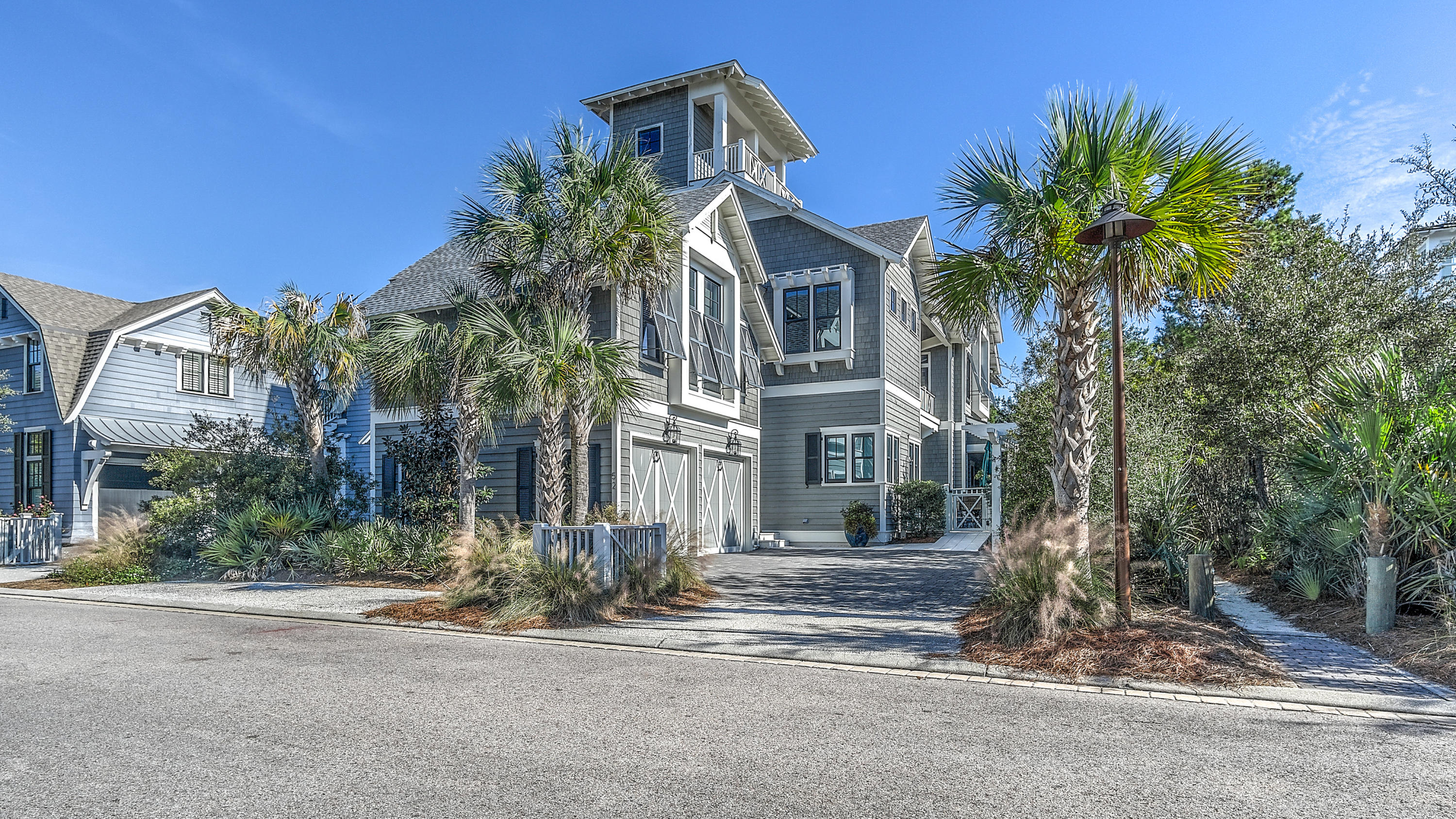 You will understand the treasure chest of wonderful beach living that this home has to offer as soon as you walk through the front door. The understated elegance is felt as soon as you enter and extends about the entire home. The inviting, main level draws you into this pristine residence with large, open, bright spaces. Enjoy grand scale entertaining in the large great room with walls of elegant windows & doors, opening to the pool deck and allowing abundant natural light and gulf breezes to flow easily throughout.
The magnificent master bedroom suite has a large walk in closet, double vanities, a beautiful over sized walk in shower and separate bath. The homes guest suites provide a getaway for family and friends alike, with ample space to relax after a day of tennis or at the beach club while the secondary master suite curbs that midnight snack craving with attached kitchenette. The bunk retreat offers the kids their own space featuring three sleeping levels and access to the media room which is the perfect area to enjoy movies or gaming away from the main level. Dramatic woodwork, significant closets and storage, beautiful wood flooring, detailed crown moldings, built-in cabinets and custom lighting compliment this impeccably maintained home!