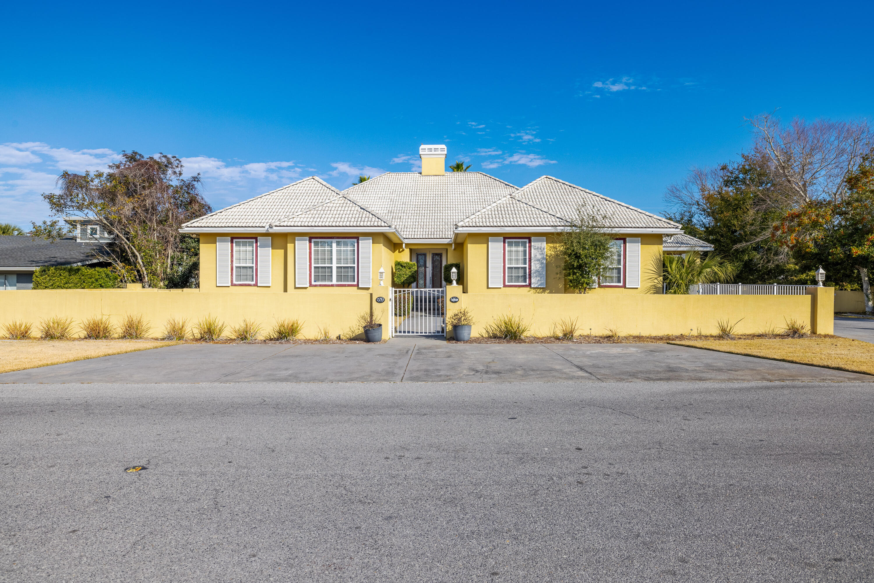 .Amazing waterfront opportunity in the desirable gated Bay Point community! A boater's dream, this home sits on a deep canal near Bay Point Bridge with a 124-ft dock! It features three separate living quarters. The main house features an open-concept living, dining, and kitchen area with stunning views of the pool and canal. Ideal for multi-generational living, there is a separate mother-in-law suite complete with a laundry room and pool access. Additionally, a canal-level studio apartment with a kitchen and full bath is perfect for a captain, guest, or teenager. Situated on an oversized lot, this property is ideal for waterfront living!SELLER IS INTHE PROCESS OF REPLACING SEAWALL.