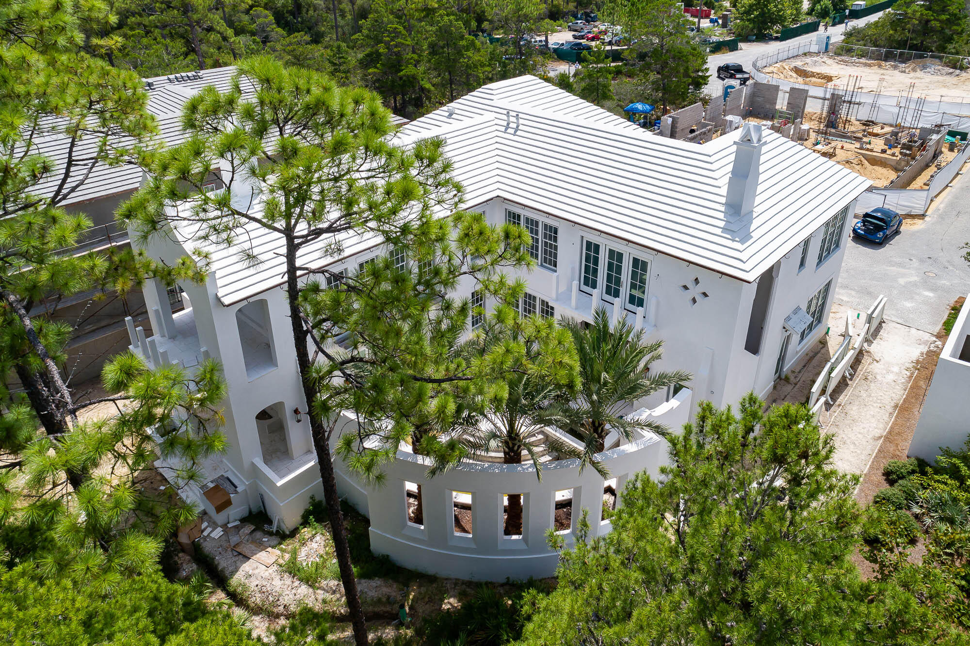 93 Featherbed Alley ensemble of creativity, livability, and peacefulness are all encapsulated with the design of 93 Featherbed Alley.  This magnificent home, designed by Domin Bock Architects, is seamlessly located on Central Park & The Nature Preserve with Caliza Pool & Restaurant in the backdrop.  
93 Featherbed Alley provides 4,810 square feet of conditioned living space with an additional 2,671 square feet of outdoor living spaces to include balconies, covered porches, and courtyards with a very generous swimming pool & hot tub.
The 1st floor kitchen is prepared for the chef in mind with 60'' Wolf Range, Sub-Zero individual freezer & refrigerator with accompanying support appliances, in conjunction with a full height wine refrigerator & wine tap for easy pouring.  The living offers distinct conversation & sitting areas flanked by the fire pit courtyard & pool courtyard allowing natural light through the interior spaces.  Large doors & windows look upon the courtyards which open for breezes & entertaining.   
This home provides 5 bedrooms with 5 en suite bathrooms plus 3 powder rooms.  The 1st floor hosts one guest suite with the balance on the 2nd level by way of elevator or stair.  The primary bedroom suite boasts a very large walk-in closet, individual vanities with decorative glass & stonework, soaking tub, with beamed vaulted ceilings above the bedding area opening to a private porch. 
Each guest suite is very generous and private individually decorated creating refuge for friends & family.  The 5th guest suite operates as an interior accessed carriage house with exterior access.  This suite hosts its own kitchenette, living room, separate bedroom with laundry for the longer-term visitor.  
In addition, the 2nd floor yields an entertainment room for family occasions with built in beverage station & cabinetry, 85" TV, and white lacquer billiards table to complete this space.  
93 Featherbed Alley is satisfactory for full time residency and to be sold furnished with designer furnishings and fixtures.