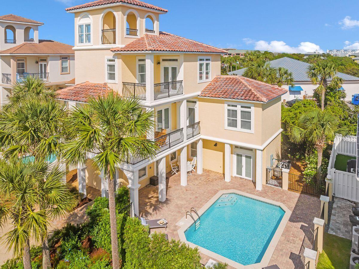 One of just 11 homes located on a private and gated street, this premier property offers the ultimate in exclusivity and privacy. Offering gulf views from the observation tower, this beautiful home is just a short distance from the idyllic white sandy beach with absolutely no roads to cross. 

Spread over four floors, this five-bed, four-bath retreat provides ample space for families and house guests to find their own quiet corner of space. The first floor is dedicated to three bedrooms, one with a private en suite and two others sharing a Jack-and-Jill bathroom. Up one level, the main living area is the place to come together for mealtimes and socializing. Tile floors, 10-ft. ceilings, quartz countertops and Kitchenaid appliances add a sense of quality to the generous space. A lengthy breakfast bar divides the well-planned kitchen from the formal dining area. Step out onto the balcony and check out the private heated pool and beautifully paved terrace below offering abundant space to host your next party. You'll also find another guest bedroom with adjoining bath here on the second floor. The third floor has a generous master suite with hardwood floors, a large walk-in closet and a private balcony with serene sunset views. The adjoining ensuite boasts a walk-in shower, double vanity and separate tub for bubbly soaks. The top floor is an intriguing observation tower, designed for enjoying cocktails, sunsets and the best gulf views. Located on the south side of 30A between Rosemary and Alys Beach, residents have direct access to a quiet uncrowded beach, a rare find in today's market. Look forward to morning walks in the sunshine with just the pelicans and dolphins for company. Return home for a refreshing swim in the private heated pool before relaxing in your own peaceful paradise. Shopping, dining and entertaining are within easy walking or bicycling distance. With ample parking, exterior storage for all the toys, large closets throughout and an unrivaled location, beach living simply doesn't come better than this.

Buyer to verify all information and dimensions, all information is deemed reliable but not guaranteed.