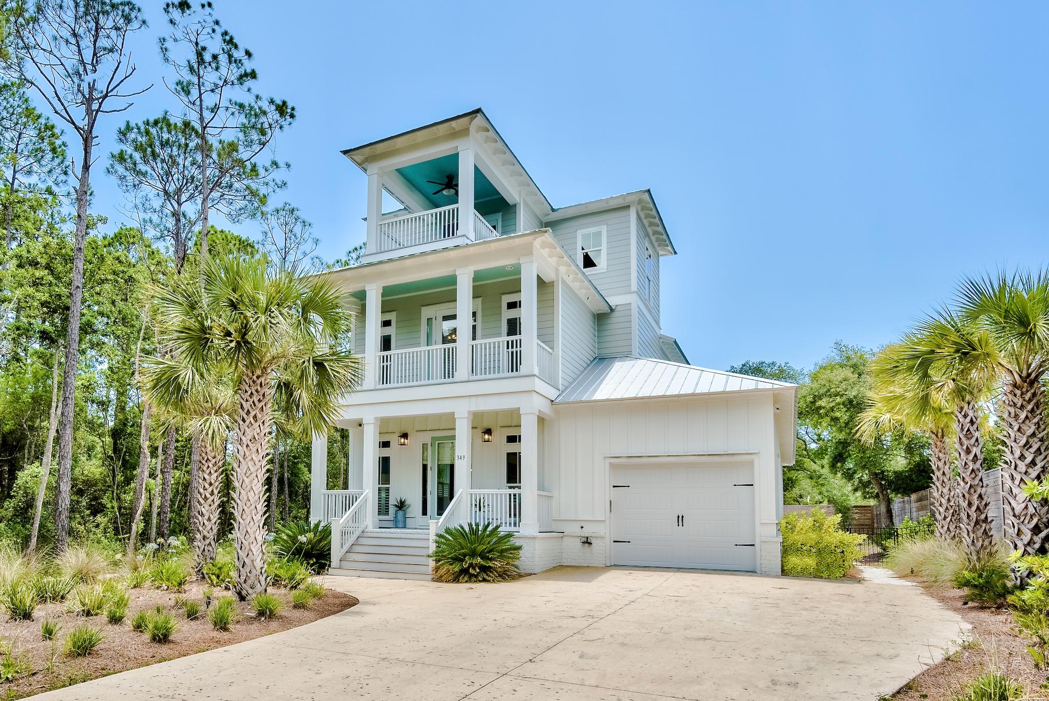 Located on the sought-after street of Seacrest Drive, this picturesque beach house boasts over 2,900 square feet of thoughtfully designed living space. Situated on a half-acre, the homesite offers privacy and ample outdoor living space centered around the custom resort-styled pool. The interiors are adorned with hardwood floors, shiplap accents, a chef's kitchen, and high-end finishes throughout. The first-floor main suite features a sumptuous ensuite with a soaking tub, custom tiled shower, double vanities, and an oversized walk-in closet. The second floor is home to a second suite in addition to the remaining bedrooms. Seacrest Beach is geographically poised minutes from the white sugar sand beaches, the iconic town centers of Rosemary and Alys Beach, and the plethora of world-class dining and entertainment venues along 30A.