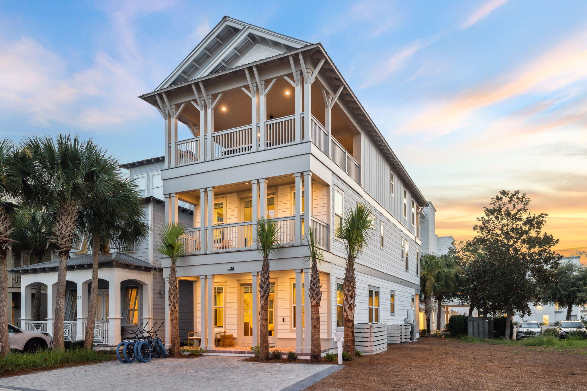 Capture this newly-built, luxury residence at the forefront of Seacrest Beach. This peaceful haven offers an incredible layout and Gulf Views from the top floor. This stunning getaway can be a coastal escape for you and your family as well as a top-producing rental property with annual rental projections at $178,650 and annual cash on cash return projections at 5%. In prime walking distance to Alys Beach, Rosemary Beach and Inlet Beach, this refreshing escape has the perfect floor plan. On the first level, you're greeted with a huge living room, open dining space & fully-loaded chef's kitchen. The first level also has a guest bedroom, full bathroom and back porch. The second level features an enormous bunk room with 8 built-in bunk beds and an ensuite bathroom Additionally, you have a spacious primary bedroom with a private balcony on this level. The top floor boasts an enchanting primary bedroom with a large built-in bar and access to the top floor veranda. The top floor veranda is a show-stopper featuring a luxe summer kitchen, outdoor dining area, TV, comfortable seating area and a fabulous view of the Emerald Coast. Offered fully-furnished, this property can be a lucrative investment property and comes with future rental bookings already in place for the new owner. Explore this sanctuary designed for relaxation, connection and unforgettable memories on the coast!