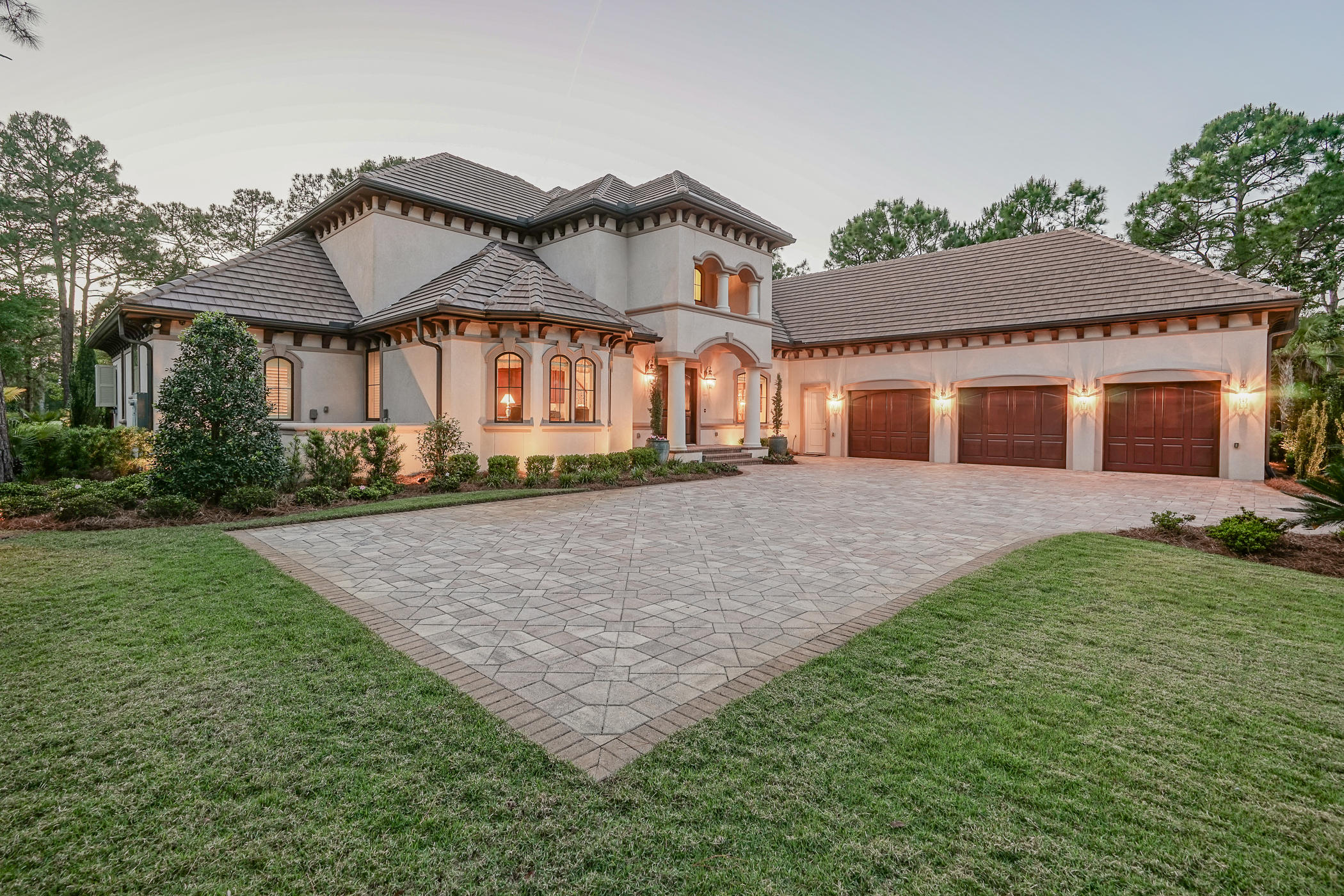 Majestic estate in the exclusive, privately gated Burnt Pine section within the resort community of Sandestin. Two story Mediterranean style custom built home, with highest quality construction and craftmanship completed in 2016. Owner reluctantly had to move because of family considerations. First floor master bedroom with his and hers baths, heated pool and spa, gourmet kitchen with Sub=Zero and Wolf appliances, granite tops throughout the home and lanai from the same block, very high quality cabinetry from heartwood in all locations by Candlelight Cabinetry, porcelain floors, media room, elevator, generator, 2 wet bars, floor to attic cargo lift from oversized garage flor to reinforced attic storage.  Well for lawn sprinklers, beautifully landscaped. Custom made garage doors and epoxy floors in the garage shows that no detail was overlooked during construction. Located on the 11th green of Burnt Pine Golf Course and overlooking a beautiful pool and exquisite landscaping, the home takes your breath away with it's visual beauty.

Huge entertaining and living areas flow seamlessly from 18' X 14' foyer into 26' X 20' living room with a wet bar area, and past 18' X 16' dining room until you reach the kitchen / family room combo of 39' X 23'.  Extra living areas abound on each floor. The  study has a private entry into the master bedroom.    2nd floor boasts a media room and 2nd wet bar, a sitting room , and even a project or sewing room.   There is a second access to the attic storage 37' X 18' plus additional mechanical storage room that houses industrial size WIFI system , alarm and heated and cooled.  20' master closet.