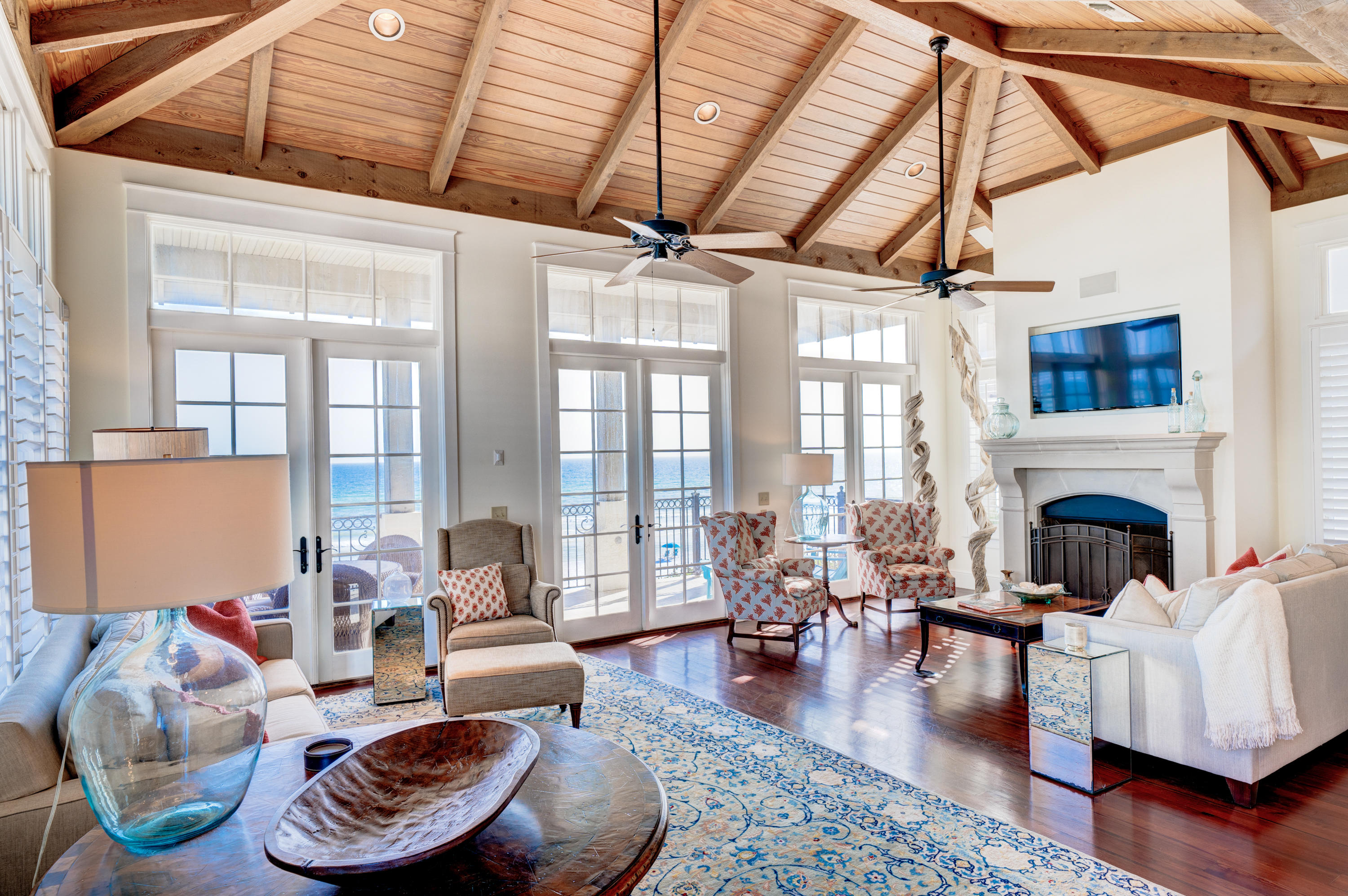 Accepting Back Up Offers. Welcome to 30A's beautiful Sea La Vie, an architectural design by Burwell & Associates and Ficarra built 4 bedroom 4 bath eastern most gulf front home, in gated Vizcaya.  Vizcaya is a gulf front beach neighborhood with 32 homesites, of which 18 are beachfront, 3 dune walk-overs and a resort pool with over 900 feet of private beach.  Located in Dune Allen Beach and rising majestically above the Gulf of Mexico's white sandy beaches this beach house offers breathtaking gulf and coastline views.  Upon entering the home azure gulf waters unfold before your eyes and the open floor plan with kitchen marrying the dining and large living room assures you this home is designed for family and friends to gather and play at the beach.  The large living area with impressive fireplace accommodates gracious seating for gatherings or may be enjoyed as separate, intimate conversational areas.  Rich hardwood floors and high beamed ceilings create a luxurious feeling. The living and dining room are wrapped with a series of windows and three sets of French doors all with transoms to let in glorious light.  Two deep porches on the first and second level span the width of the home and are ideal for relaxing while warm gulf breezes caress the body and soul.  The kitchen features stainless steel appliances, gas cooking, plenty of cabinetry and an over-sized walk-in pantry. The first level Master Bedroom Suite lets on to a private gulf front porch.  After a soak in the tub slip on to the porch in your robe from the Master Bath and star gaze under a soothing night sky.  There is even a small under-counter frig for beverages and a coffee bar.  One of two large adjoining Master Bedroom closets is currently utilized as a private owner's storage as are 2 additional closets on the first level for a total of 3 owner's closets.  A private terrace on the north side of the beach house lends itself as a sweet escape for enjoying open air sunning.  Bringing the kids in from the beach just got easier. In addition to the outdoor shower there is also an extra bath inside the first level entry right next to the laundry.  Sea La Vie in gated Vizaya is located in Santa Rosa Beach and convenient to all that 30A has to offer.  After you have played at the beach, discover boutique shops and galleries in the nearby coastal towns of Gulf Place, WaterColor, Seaside, Alys Beach and Rosemary Beacht.  Enjoy dining gulf front at The Santa Rosa Golf & Beach Club's Vue on 30a.  Find the catch of the day at Shunk Gulley or Stinky's.  Simply walk or bike to Gulf Place for coffee, pizza, ice cream, and more  Explore the beauty of nearby Topsail Hill State Park.  Whether you wish to lounge by the pool, relax at the beach, or bike along 30A, it's all here waiting for you at 1025 Vizcaya.  Make this your home on 30A!
