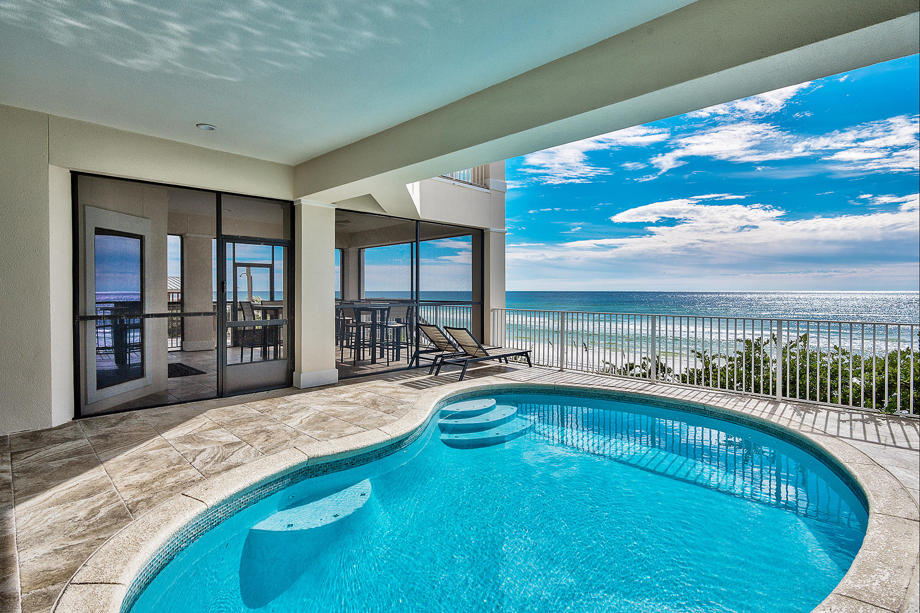 This absolutely stunning 8 bedroom, 7-1/2 bath, Gulf front home along Scenic Highway 30A in Santa Rosa Beach is completely renovated and in pristine condition. From the private beach facing pool, carriage house/ guest retreat, and premier location, the amenities are top notch. As an added bonus, this 5,561 square foot home is being sold completely furnished, perfect for those interested in buying a vacation or investment property.
Bathed in soft, appealing neutral colors throughout, the large entry flows into an open relaxing living space made all the more impressive by the wall of brand new windows showcasing one of a kind beach views. A slider leads outside to the pool and the large enclosed patio area - perfect for entertaining or viewing the gorgeous sunsets. The living room is large and open with views in every direction for relaxing and entertaining. The spacious kitchen has many upgrades, including top of the line stainless steel appliances and an ideal eating area overlooking the incredible views. 

Every bedroom is a relaxing retreat, all with new carpet, painting and luxurious furnishings that make this better than any 5 star hotel.  Even younger guests will enjoy the bunk room that has been designed with fun in mind!  Six bathrooms have all been  renovated.   No detail has been overlooked,  making this home ready for you to enjoy today.

The 2 bedroom, 2 bath Carriage House is over the three car garage and offers great privacy and additional space for guests and family.  Renovated in 2014, this charming getaway has been  beautifully decorated with a coastal chic flair. Complete with stainless steel kitchen, upscale, yet relaxing furnishings, and quality workmanship throughout, chances are, your guests will never leave.

This home has been extensively renovated - both the main house as well as the carriage house.   Buyers can rest assured that this home is a place where memories are ready to be made!