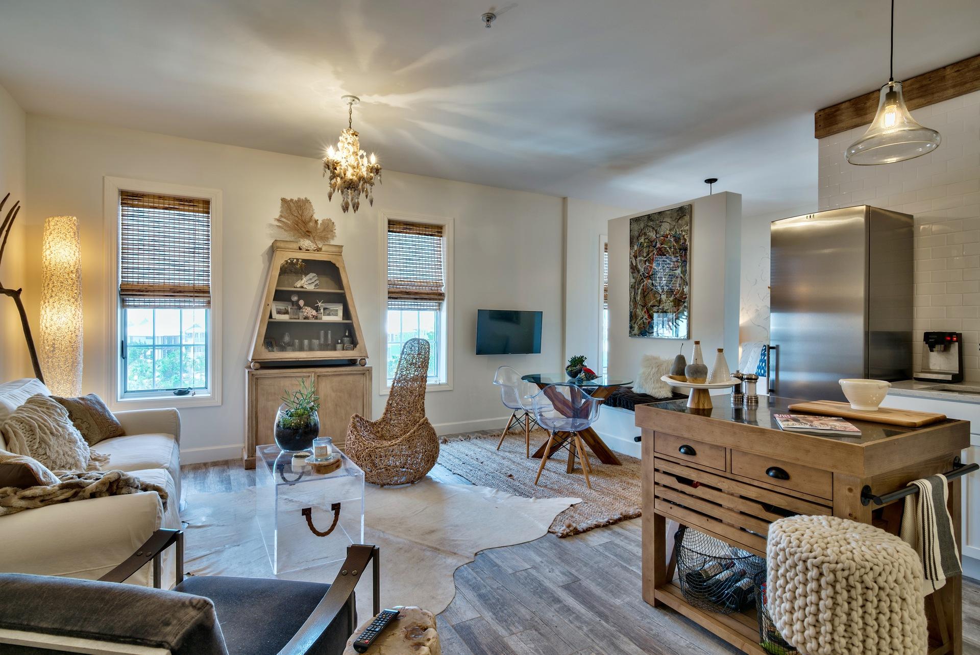 Picture yourself here! This immaculate custom designed studio is the one of your dreams. A private foyer welcomes you as you enter an open and inviting living area that flows perfectly into a lovely, well-appointed kitchenette featuring a custom made island, full size refrigerator, cooktop, convection oven and microwave. Not to mention, plenty of storage space. A floating wall has been added to separate the bedroom from the entirety of the condo. New A/C, New Hot Water Heater, New Floors, you name it! This condo is one you don't want to miss. Exceptional in every way! The Village of South Walton is located between Rosemary Beach and Alys Beach, a short walk or bike ride to numerous shops and restaurants! Tram service to the deeded beach access is offered to residents and guests. Currently, owners and guests have access to the lagoon pool shared with Seacrest Beach.  Construction of the beautiful new lagoon pool for condo owners and guests is underway with an estimated completion of early Spring 2017.