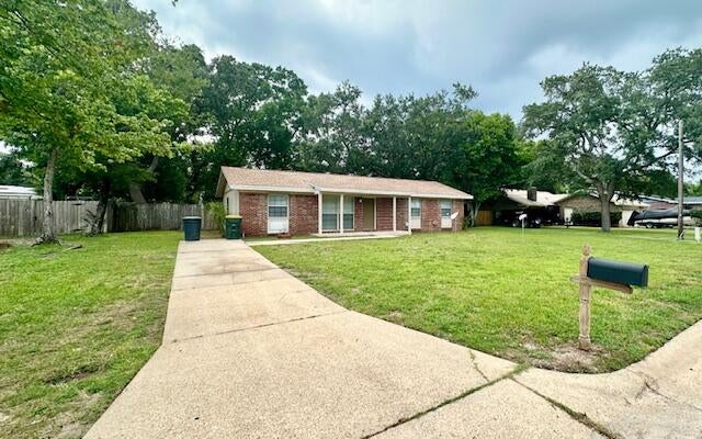 AVAILABLE: 9/12. FLEXIBLE S/D = TO 1 MONTHS RENT CAN BE MADE IN 2 MONTHLY INSTALLMENTS IF QUALIFIED. Welcome to this remodeled, all-brick, single-story home located centrally in town & close to it all! This home boasts 3 spacious bedrooms, a bonus room & a full bathroom. The interior has been freshly painted 1 year ago & fitted w/ newer LVP flooring throughout, giving it a modern & stylish look. The kitchen is equipped w/ stainless appliances, ready for your culinary adventures. The large, privacy-fenced backyard is perfect for outdoor activities or simply enjoying the Florida sunshine. The house also features a screened patio, providing a comfortable space for relaxation or entertaining guests. A covered front porch adds to the charm of this home. Experience the comfort & convenience of this lovely home! Sorry, no pets/smoking allowed.