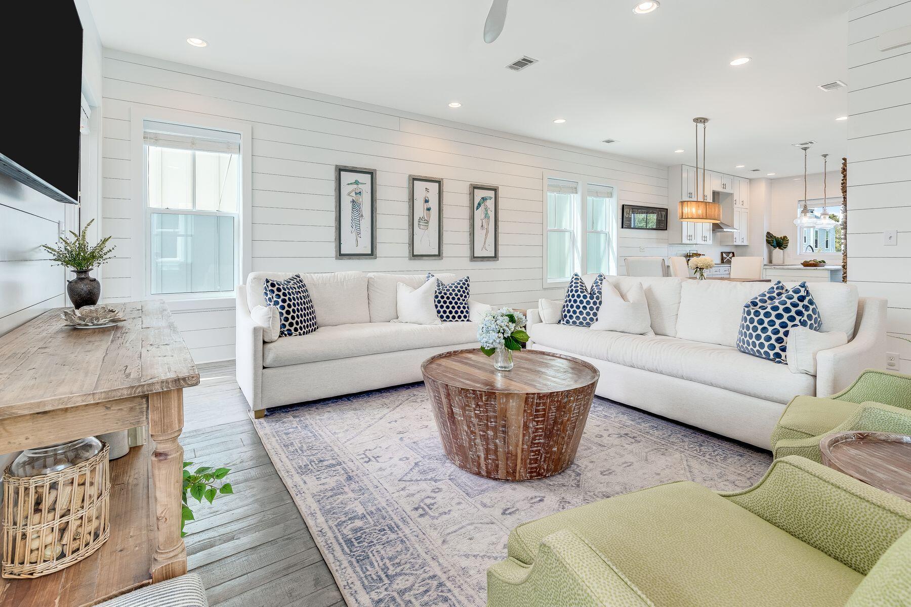 *Price Recently Reduced by $100k, Motivated Sellers!* Just a stone's throw from the breathtaking white sandy beach, this beautifully refreshed coastal retreat blends modern elegance with relaxed beachside charm. Thoughtfully updated with serene decor, natural textures, and sophisticated lighting, this three-story home showcases stunning Gulf views from multiple porches. Positioned just 250 feet from the largest beach access in South Walton, it offers three dune walkovers, seasonal lifeguards, and beach chair setups—perfect for both memory-making and rental potential. Overlooking a charming community pool, this 4-bedroom plus bunk retreat boasts hardwood flooring throughout, soaring ceilings, and abundant natural light. The first floor features a primary suite, a guest bedroom, a den with additional bunks, and lounge area, creating welcoming and functional space for guests. The second-floor open-concept living and dining area has been refreshed with stylish furnishings, shiplap accents, and beautifully layered lighting, spilling out onto a spacious covered balcony perfect for dining and catching a sunset over the Gulf. The generously sized kitchen shines with marble countertops, high-end stainless appliances, and an oversized island with seating. On the third floor, you'll find the second primary suite, offering breathtaking Gulf views and an elegant ensuite bath. An additional king guest bedroom with a private bath and a large porch with panoramic Gulf views complete the top floor. Located in Park Place at Inlet Beach, an intimate community of just 10 homes, this property is within walking distance of Rosemary Beach's boutique shops and renowned restaurants. For adventure seekers, Powell Lake provides kayaking, paddle boarding, and fishing, while Camp Helen State Park offers scenic hiking and birdwatching. The nearby artificial reef, just 970 feet offshore, is perfect for snorkeling and diving. After a day of exploration, return home to unwind on the deck, taking in the colorful Gulf sunsets from your private coastal haven.