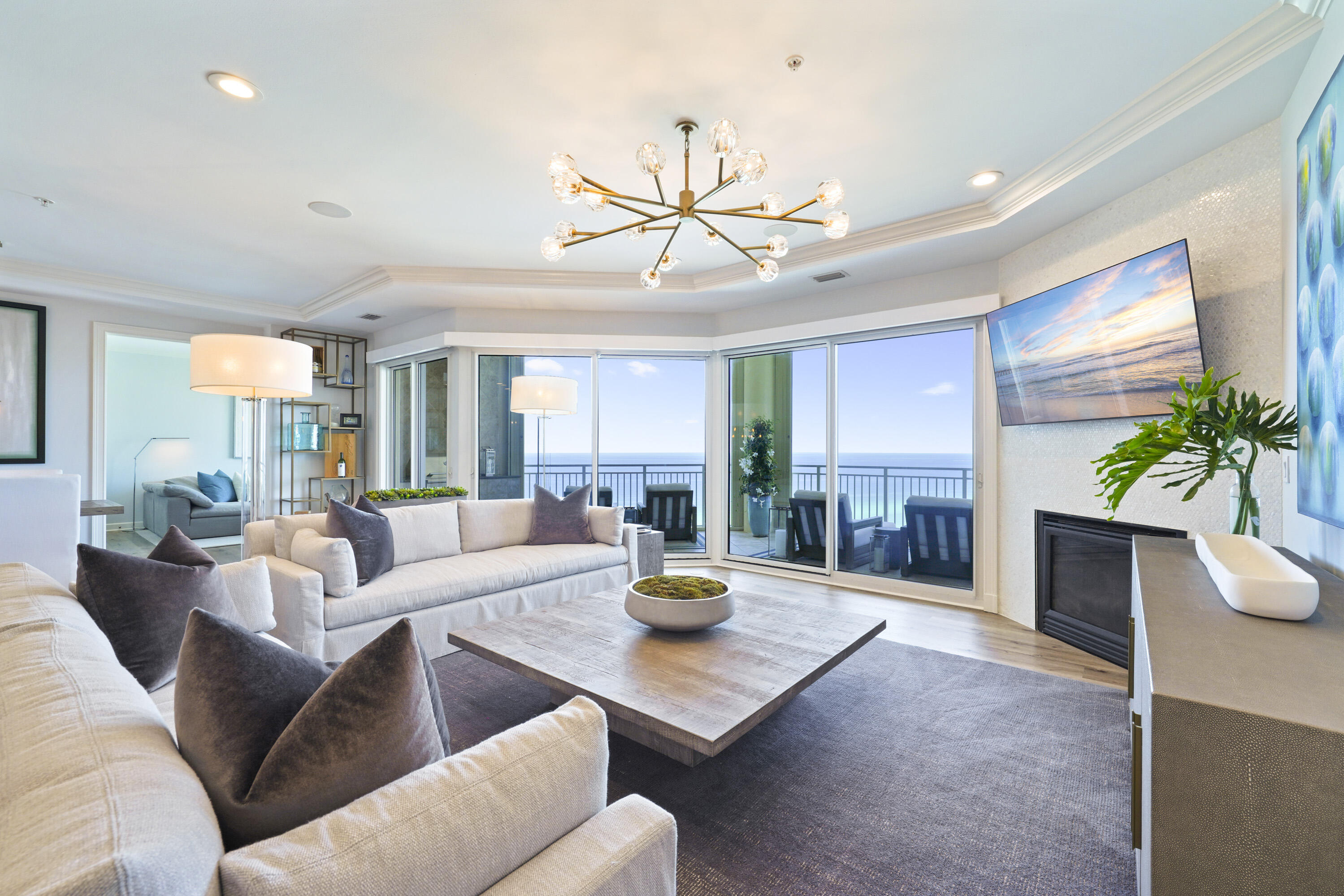 This Villa in Grand Dunes South Tower is perfectly located on the 11th floor, giving it gorgeous, unobstructed views of the emerald green waters of the Gulf of Mexico and the sugar white sands of South Walton. Experience the ultimate beachfront lifestyle in this gorgeous, rental restricted 4 bedroom, 4 bathroom Villa in the heart of Miramar Beach. This stunning Villa offers 2,720 sq. ft. of living space. What makes this unit unique is that all 4 bedrooms have beautiful views of the Gulf and two of the guest bedrooms offer views of the Gulf and the Bay! From the moment you step into the unit from your Private Elevator Foyer, you will immediately notice the detail and time that the Sellers have taken to upgrade and bring this gorgeous Villa to life.

Features of this unit include: Anise LVP flooring throughout the entire villa and travertine stone flooring in the baths, "Calcatta Laza" Quartz countertops in the kitchen and guest baths with custom sinks, a ''premium'' stainless steel appliance package which includes a "Kitchenaid" 5 burner natural gas cooktop, double ovens, stainless steel deep kitchen sink, cabinetry with crystal "RH" hardware with soft-close drawers, upgraded light fixtures throughout including a "RH" 60" Boule De Cristal Clear Glass Round Chandelier, flush mount speakers in the living area, 9.5 ceilings with crown molding, ''super quiet'' interior pre-wired for the latest security and audio/visual for home entertainment, 8' solid wood interior doors leading to the Primary bedroom, a natural gas fireplace with custom Seychelles accent tile and Solar shades in the living area, Primary and Gulf Front Guest with remote controls. The Primary bedroom features tray and coffered ceilings adorned with a "RH" Halo Chandelier, a Gulf-front sitting area, and his-and-hers walk-in closets with real wood shelving.The Primary bath offers a separate dual head shower, jetted tub with travertine surround, separate water closet and custom cabinetry.

Step out onto the expansive 11-foot deep Gulf front balcony, where you can begin your day with coffee and stunning water views or unwind with a glass of wine as the sun sets over the horizon 365 days a year.  The large Gulf front balcony of this Villa has over 350 sq.ft of space, along with a built-in natural gas grill and all protected by "Hurricane Shutters."

Grand Dunes offers: 24 hour security, gated entry, lush landscaping, 2 levels of gated underground parking for Owners, semi-private elevators leading into the private foyer of your Villa, private heated pools and hot tubs, Owner's Lounge with Fitness Room, Over-Flow Suites for owners and their guests, 200' of deeded beach, Lagoon Style Gulf Front pool and beach service.

"Grand Dunes is the Emerald Coast's Most Desired Rental Restricted Beachfront Development"

Call us today to schedule your private viewing of this gorgeous Villa!