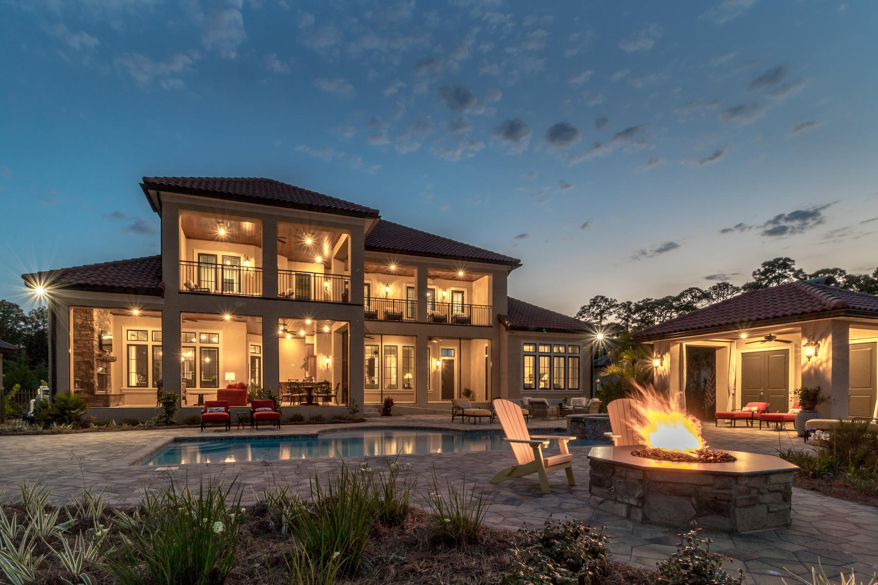 Located just 7 minutes north of Sandestin and Grand Blvd yet worlds away rests a stunning custom estate situated on 101 ft of Choctawhatchee Bay. This 2016-built, ICF constructed, 6,478 sqft, geothermal heated/cooled, transitionally designed architectural beauty is unequaled in craftsmanship and design. This home blends perfectly with its wooded surroundings, strategically revealing the magnificence of the natural landscape. A spectacular, visually-stirring bayfront oasis features a full-size, heated, saltwater pool; elevated spa; lounging areas; fire pit; cabana with shower; and screened-in lanai with fireplace and well-appointed summer kitchen. The large dock includes a swim platform; two jet ski lifts; and a covered and lighted boatlift that accommodates a 6,000 lb boat. All outdoor spaces including the dock have access to Wi-Fi and the full-home audio system. ICF construction and aging-in-place features ensure this home will last for a lifetime and many generations to come. Inside, traditional finishes mixed with modern materials create a classic, timeless design. Notable design details include custom millwork and trim; satin finished Nickel lever door and window handles; custom travertine floors and engineered hardwoods; solid doors; crystal chandeliers, electric-controlled shades, beautiful wood columns; full-size elevator; custom ceiling fans; and 12 and 10 ft ceilings. The custom chef's kitchen is a showpiece with quartz counter tops, two islands with sinks, bar seating area, soft black cabinets, paneled appliances, and hand-painted, Italian backsplash. Premium appliances include a Wolf 6-burner gas range with two ovens, Sub-Zero refrigerator, warming drawer and Bosch dishwasher. The wet bar features a bar-size refrigerator, wine refrigerator, ice machine, sink, wine rack, and storage. This home provides 4 dining areas for entertaining: a formal dining room, a Bayfront keeping area with seating for 10, an outdoor dining area, and a large breakfast bar. Located on the main floor, the master suite presents sweeping Bay views and immediate access to the poolside lanai. Featuring a luxurious soaking tub with jets, walk-in shower with slate finished walls and multiple showerheads, two custom-designed closets, and designer finishes, the master en suite is a spa-like retreat. The second floor boasts 4 bedrooms, a study, family room with wet bar, and a large lanai. The 3-bay garage features built-in storage, custom flooring, heated/cooled workshop, and a deep sink. Additionally, this Frank Janssen built home features a covered gutter system with extended drain lines, concrete tile roof with waterproof membrane, 10 ft elevation above the Bay, 18K Generac gas generator, pool alarm system, Rainbird sprinkler system, LED lighting, 4 interior geothermal units plus additional units for pool and workshop, sound proof interior walls, security system, home audio, and much more.
