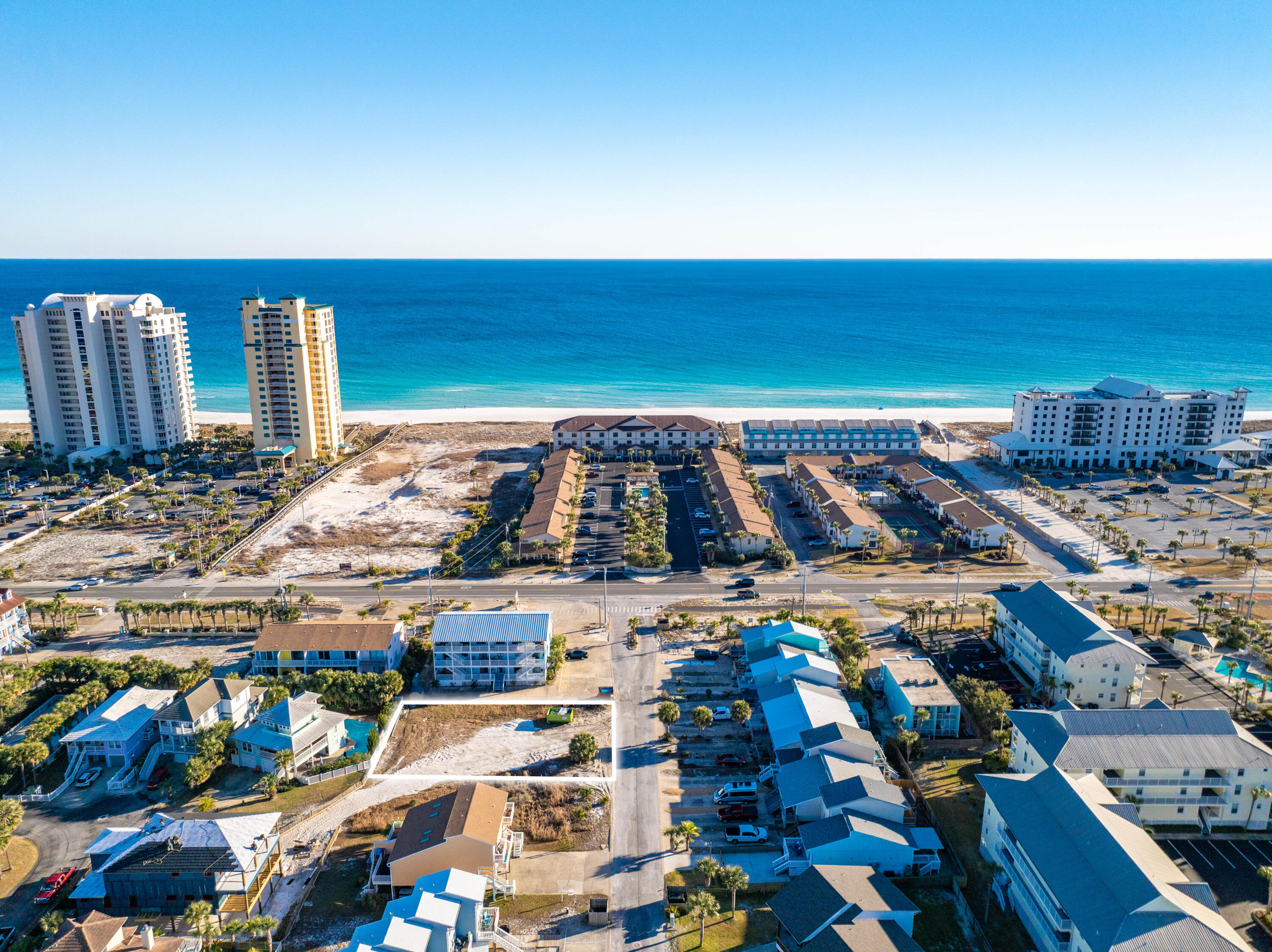 Prime Navarre Beach development opportunity with rare high-density multi-family zoning—ideal for investors and builders seeking a fast-tracked route to going vertical with construction. 
Located across the street from beach access, this cleared vacant lot offers a premium setting with Much of the upfront work is already fulfilled. Plans for a tri-plex are already completed, and both survey and soil tests have been executed, significantly reducing holding time and accelerating your path to begin construction.
Short-term rentals are permitted, opening the door for excellent income potential upon completion.
With limited multi-family inventory on Navarre Beach, this property presents a compelling opportunity to develop a high-performing tri-plex just steps from the Gulf. Whether your strategy is build-to-rent, short-term rental income, or resale upon completion, this site is positioned for efficiency, scalability, and return.
Opportunities like this are increasingly raresecure your footprint on Navarre Beach and bring a premium coastal project to life.
Navarre Beach is one of the last areas with an "Old Florida" appeal and a fantastic place to live and own a piece of paradise. Navarre Beach has miles and miles of white sandy beaches and stunning emerald hued waters. There's plenty of leisure activies to enjoy whether on the Gulf or the Santa Rosa Sound, with parks, hiking/biking paths, and the spectacular Gulf Island's National Seashore. Just over the National Seashore is Florida's renowned Pensacola Beach where you can enjoy even more entertainment, shops, and restaurants.