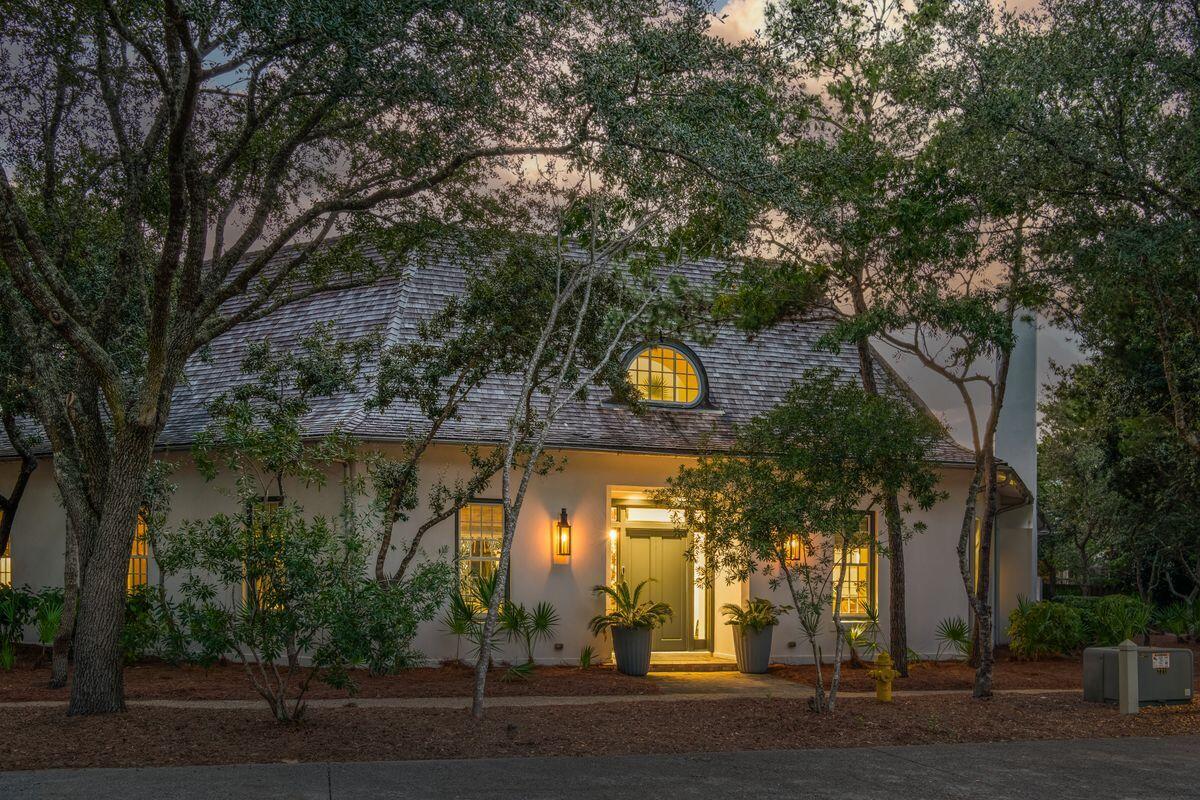 Welcome to 194 West Kingston Drive, the celebrated 2012 Coastal Living Magazine Ultimate Beach House. Designed by Lew Oliver, built by Stan Banecki, and elevated by renowned interior designer Jonathan Savage, this home blends timeless architecture, Venetian plaster walls, shiplap ceilings, and thoughtful upgrades into a one-of-a-kind residence. Situated on one of Rosemary Beach's largest and most private lots, the property offers a rare combination of scale, privacy, and design pedigree. Built with families in mind, the home was designed so that three or four different age groups can comfortably gather while still having their own retreat. From expansive living spaces to intimate enclaves, every detail of the layout encourages connection while offering privacy, relaxation, and luxury.

Stepping through a 12-foot entryway, the main level features the primary suite with en-suite bath, two additional guest quarters with their own en-suite baths, and a bunk room that sleeps four. Multiple living areas, a home office, and a powder room ensure plenty of space for daily living and entertaining.

The second level offers an additional guest suite with en-suite bath, a second bunk room accommodating six with its own bath, a powder room, and a second laundry. The showstopper of this floor is the in-home theater, complete with a wet bar and dual Uline refrigerator drawers, as well as another flexible living area perfect for gathering or retreat.

The property extends beyond the main home with a climate-controlled two-car garage that includes a convenient powder room for pool use. Above the garage, the carriage house provides even more living flexibility with a full bathroom, wet bar, and two hideaway bunks.

At the heart of the home lies an expansive private courtyard featuring a stunning 50-foot heated pool and a fully outfitted summer kitchen with a 70-inch Thermador refrigerator/freezer, Lynx 75-inch grill, and Lynx ice maker. Indoors, the chef's kitchen continues the theme of luxury with Thermador Professional appliances, including a six-burner range with griddle and a scullery and expansive pantry. 

Every element of 194 West Kingston has been curated for comfort, connection, and sophisticationoffering coastal living at its most luxurious.