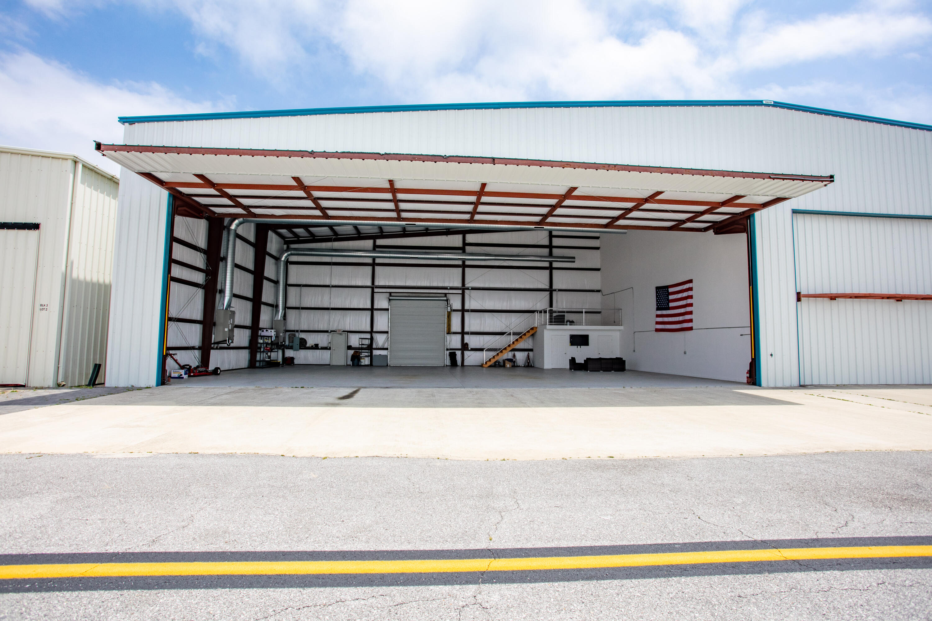 SIGNIFICANT LIST PRICE REDUCTION ★ The Destin Executive Airport (DTS), located in the heart of Destin, Florida, rarely offers private leaseholder interest in hangar opportunities.  We are now offering one of the finest hangars that will accommodate quite an array of aircraft.  The conditioned space offers a large automatic roll-up door for rear access of vehicles, with an enormous automatic bifold door, both of which contain sensors to shut off both air conditioner units once either door is automatically opened.  The current lease term matures in 2037, with a (20)-year option to renew thereafter, which length of term and option to extend has become quite a rarity in and of itself at this private airport.