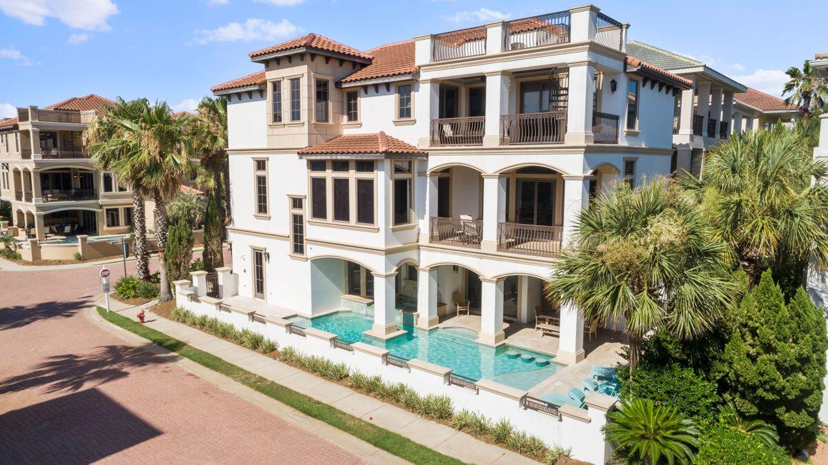 An exceptional opportunity to secure this striking seven bedroom gulfside retreat in the prestigious guard gated enclave of Destiny by the Sea! ''Wahoo Yahoo'' is an extraordinary rental machine with a consistent and proven rental record offering optimal yield. The first level was designed for entertaining, offering a private resort style pool with built-in bar stools, waterfall, tanning shelf, and covered patio adjacent to the first floor game room featuring a pool table, foosball and entertainment center. The first level also offers custom bunks with a thoughtful layout for the whole family. Other notable features include a private elevator, second floor chef's kitchen and adjoining open living room as well as beautiful gulf views from the third floor oversized master suite and rooftop viewing deck. Destiny by the Sea is a gated resort development offering private neighborhood beach access and excellent positioning in the heart of Destin, FL close to world class shopping, dining and local entertainment.