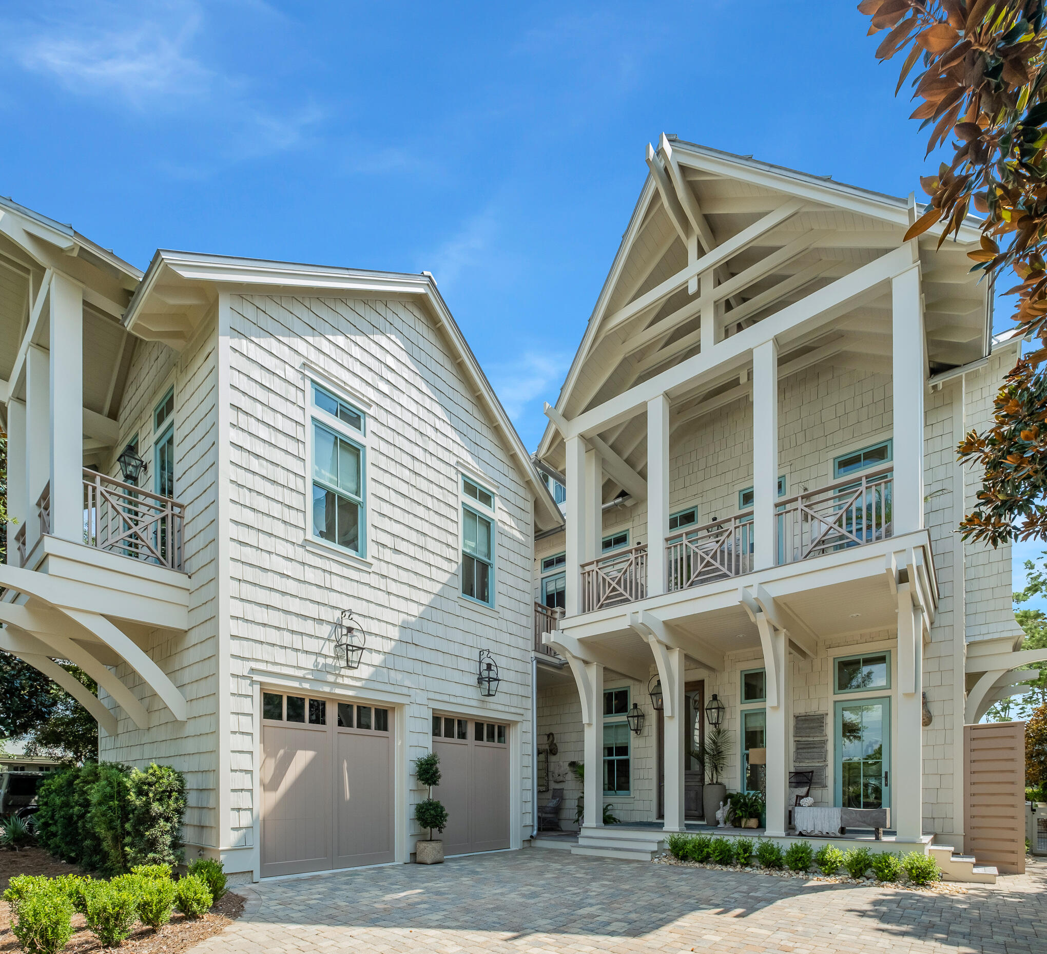 Reigning on one of the most sought-after homesites in the Lake District of Watercolor, this impressive edifice is framed by Western Lake and the surrounding picturesque vegetation. Executed by the renowned architect Dawn Thurber and the building team at Romair Construction, this inimitable architectural masterpiece spans four levels with over 5,400 of articulated living space.

Upon initial approach you are greeted by a gas lantern-lit courtyard with fountain and spacious porch leading the way to the grand front door and foyer. Adorned with Venetian plaster and antique beams, the stately living and dining areas open up to the Chef's kitchen boasting custom cabinetry, a professional appliance suite, and an oversized island. Synonymous with tranquility and relaxation, the backyard oasis effectively blurs the line between indoors and out providing a spacious screened porch with sitting and dining areas in addition to a pool with cascading spa and fenced green area. A bedroom with ensuite, full bathroom, and laundry area are also found on the first floor. The stairwell with wide accent-lighted antique white oak treads and shiplap walls provides access to the upper levels.

Situated on a private wing, the main suite encompasses sleeping quarters and a sitting area overlooking the idyllic Coastal Dune Lake views, direct porch access, walk-in closet, dedicated laundry suite, and a posh ensuite with soaking tub, double vanities, and a custom tiled shower. Access to the fully sufficient coach house, two-bedroom suites, office, and a flex area perfectly configured for a bunk room or additional storage complete the second level.

An additional office area and living space with wet bar reside on the upper two levels. Perched atop the roofline, the fourth-floor porch is the perfect place to admire the palette of vibrant colors and majestic glow emulated from the famed Emerald Coast sunsets. Watercolor affords residents with a culmination of amenities including a beach club, fitness center, town center, tennis courts, and ample walking trails while remaining geographically poised minutes from all the world-class dining and entertainment venues 30A has to offer.