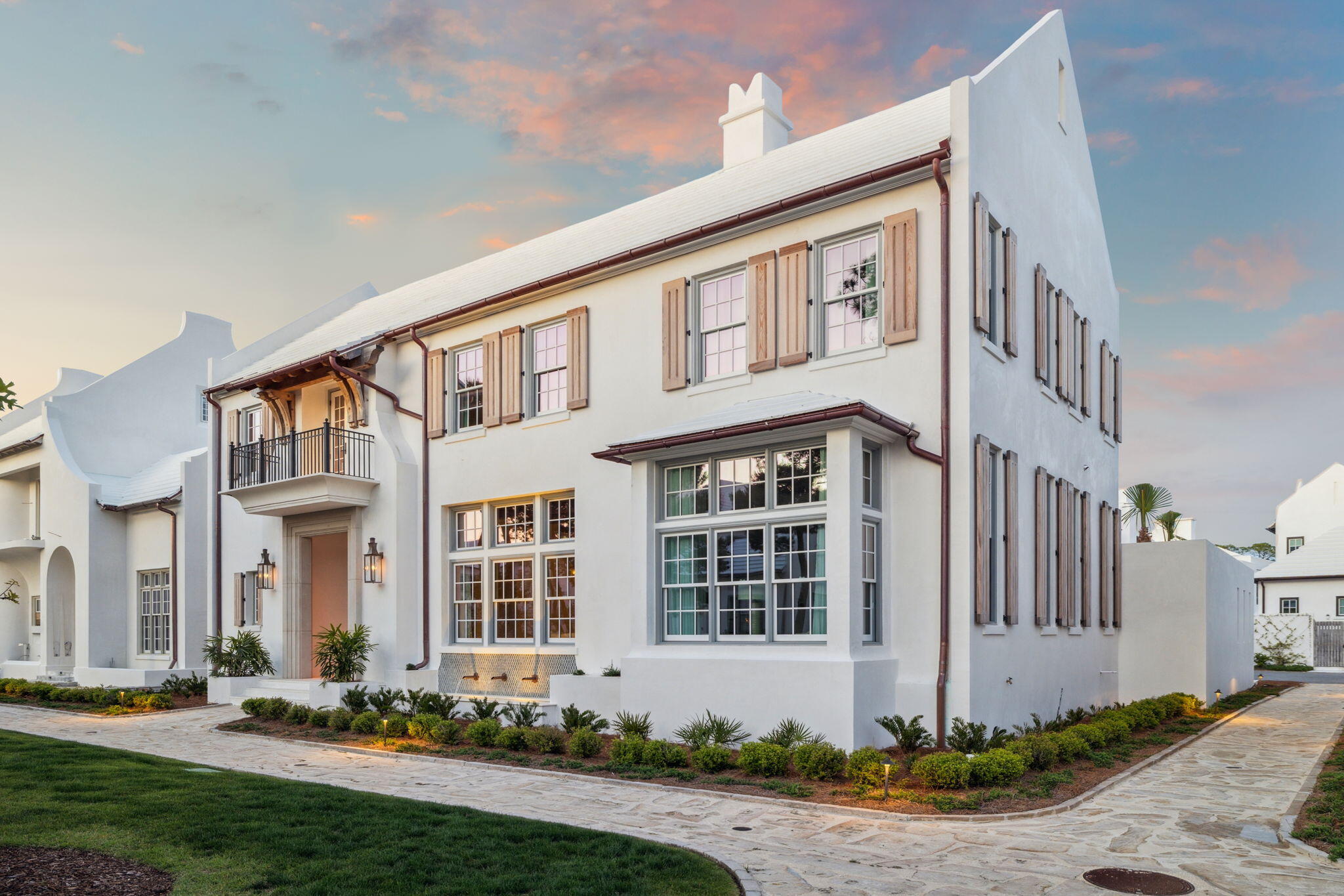 A masterfully designed retreat in the heart of Alys Beach, 117 Whalebone Aly blends striking architecture, artisanal craftsmanship, and luxurious comfort into a timeless coastal sanctuary. Positioned on a prime corner homesite along the Turtle Bale pedestrian path, this residence offers exceptional privacy while being just steps from the sugar-white sands and the vibrant energy of 30A.

Designed by renowned architect Paul Geary and brought to life by John Brown of Gulfview Construction, this residence reflects the essence of Alys Beachâ”where beauty, balance, and simplicity converge. With 5 bedrooms, a custom bunk area, 5 full bathrooms, and 2 half baths, the home was thoughtfully created for multi-generational livingideal for grandparents with young families or siblings building shared traditions.

The open-concept interior is a work of art, featuring Venetian plaster walls and handcrafted antique oak beams, trim, and wall accentseach detail meticulously selected and created by some of the Southeast's most skilled artisans. The kitchen is outfitted with professional-grade Wolf and Sub-Zero appliances, blending culinary performance with design-forward elegance.

Seamless integration between the indoor living spaces and the expansive private courtyard allows for effortless transitions between relaxing inside and entertaining outdoorsenhancing the home's livability and flow. The second level also features a spacious secondary living area, offering additional room for gathering, relaxing, or hosting.

Upstairs, the primary suite serves as a tranquil sanctuary, complete with a rooftop terrace and fire featurea breathtaking space to unwind under the stars.

Outdoors, the oversized courtyard becomes an extension of the living space, offering multiple lounge and dining areas, a private pool, poolside bathroom, a grilling station, and a large outdoor fireplaceperfect for both entertaining and quiet moments of retreat.

Offered fully furnished, this is more than a homeit's a legacy property, a seamless fusion of design, comfort, and the timeless spirit of Alys Beach.