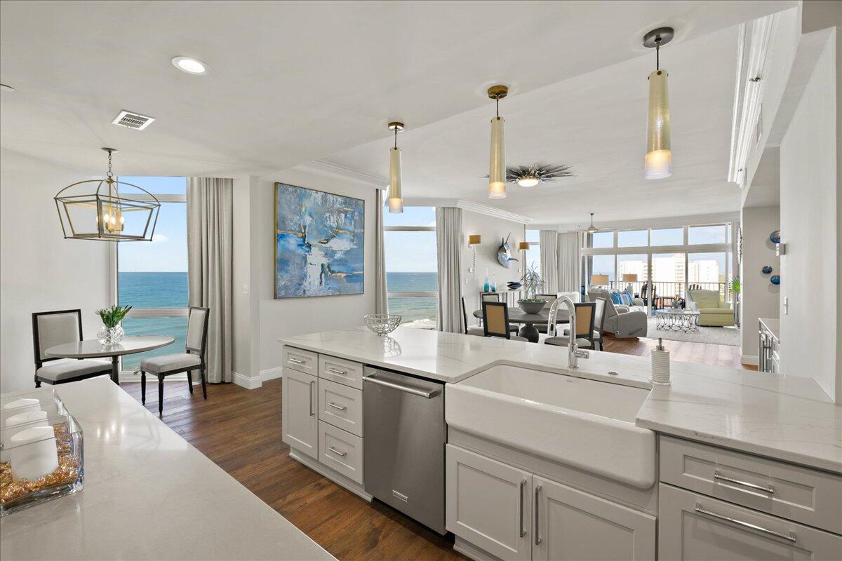 When it comes to  ultra luxe Gulf front living, the allure and stature of Regency Towers remains unrivaled.  Sprawling half of the ninth floor, this three-bedroom residence is the epitome of private coastal living. The recent remodel curated by the renowned designer Jill Doughty encompasses an open concept, clean lines, and a sophisticated yet minimalistic flair.  Upon initial entry, the grand vestibule leads the way to the foyer showcasing 10' ceilings, aged Oak hardwood flooring, and countless premium finishes that are carried throughout. Flooded with natural light, the two junior suites enjoy beautiful views paired with spa-like ensuites and walk-in wardrobes. The expansive main living and dining areas offers sweeping 180-degree views of the turquoise hued waters effectively blurring the line between indoors and out. The gourmet kitchen encompasses custom cabinetry, dual kitchen islands, quartz countertops, and a luxury appliance suite.  

Ideally situated to prepare a morning beverage or evening night cap, the fully equipped wet bar is located just off of the living area and steps away from the balcony which is the perfect place to admire the new palate of mesmerizing hues emitted by the renowned Emerald Coast sunsets each and every night.

Synonymous with relaxation, the bright and airy main suite is a true oasis boasting floor to ceiling windows, a nook for a desk area, and dual walk-in wardrobes. The sumptuous ensuite features dual vanities, custom tile selections, and an oversized rainfall shower. 

The intimate non-rental low-density community of Regency Towers is tucked away behind the private gated entrance and bordered by lush vegetation reigning on nearly four acres. The sought-after complex affords residents with world-class amenities including concierge services, on-site security, covered parking, club house, game room, fitness center, dual saunas, pool, tennis court, basketball court, shuffleboard, private beach frontage, and a dedicated climate-controlled storage area for each residence. The culmination of luxury and exclusiveness creates a truly intimate setting while still remaining geographically poised near all of the acclaimed dining and entertainment venues Destin has to offer.

Residence 7092 is offered furnished and accessorized making it a compelling and turn-key opportunity for full time and second-home residents alike. Inquire today to arrange a private viewing and start living the coastal lifestyle you deserve.