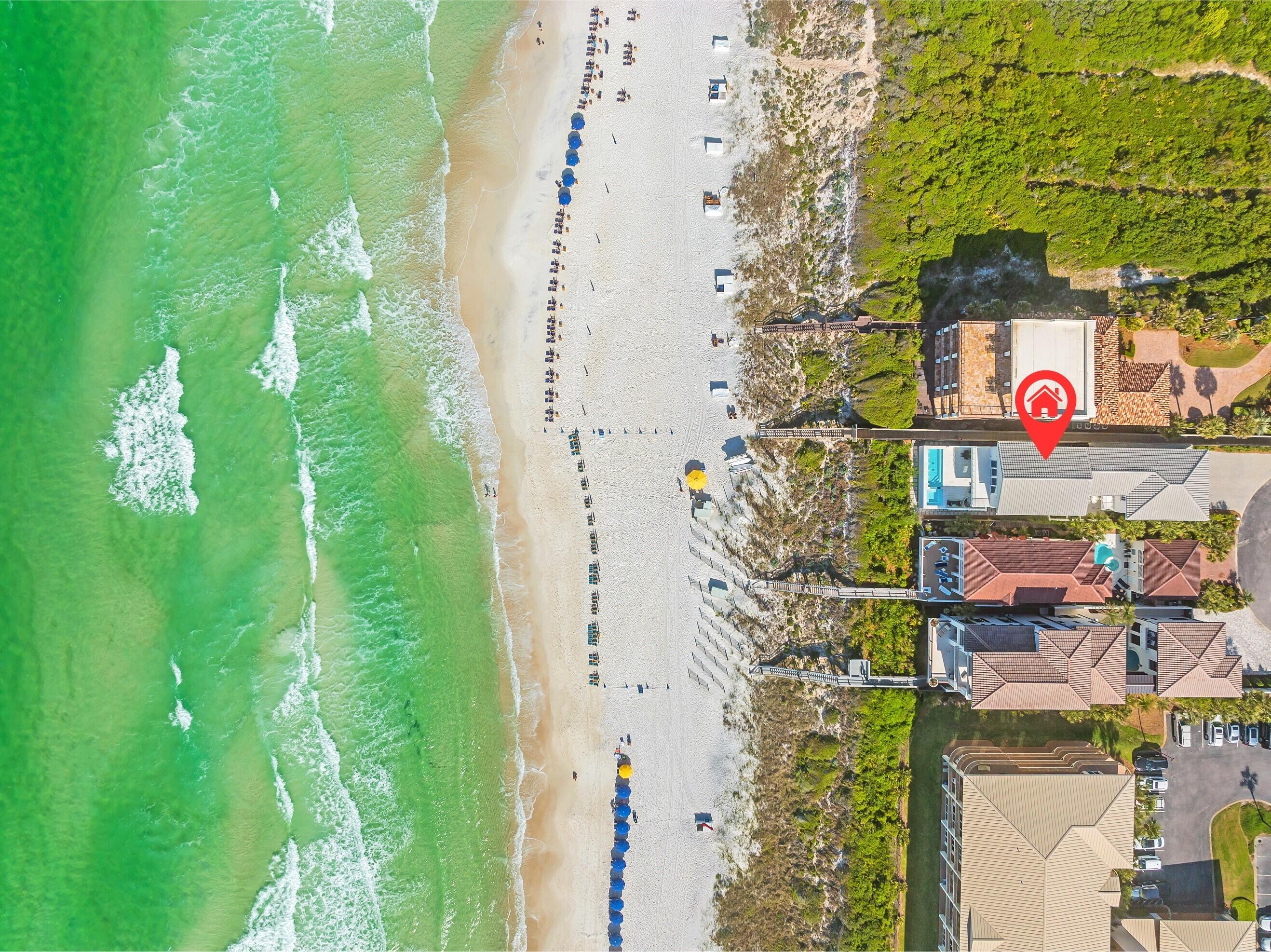 Nestled between the highly coveted communities of Rosemary Beach and Alys Beach along Scenic Highway 30A, 108 Longue Vue Drive is perfectly positioned on a quiet cul-de-sac in a private, gated enclave of only 11 homes.  With over 6,200 square feet of modern, gulf-front luxury, this stunning home also boasts a pristine, private beach with deeded ownership to the Mean High Water Line. Whether you are taking a dip in the heated saltwater pool, soaking in the hot tub or luxuriating in your third floor primary suite, you will have a 180-degree view of the Gulf of Mexico that is sure to soothe the soul. There is an abundance of outdoor living that can be enjoyed in the private, gated courtyard, the generous pool terrace or the balcony of your primary suite. Completed in 2021, this property was expertly engineered with concrete, 90 reinforced pilings, a 24" deep concrete slab which has two rebar mats, and a 3-layer stucco system allowing the home to withstand the most extreme coastal conditions. The interior of the home is no less spectacular with 3 kitchens, 3 laundry areas, an elevator and a courtyard residence that has a separate lockable entrance, a safe/vault room and custom finishes. The only thing missing is you.  ***Buyer to verify all dimensions of square footage as the Walton County Property Appraisers Office figures and the architectural drawings differ.***