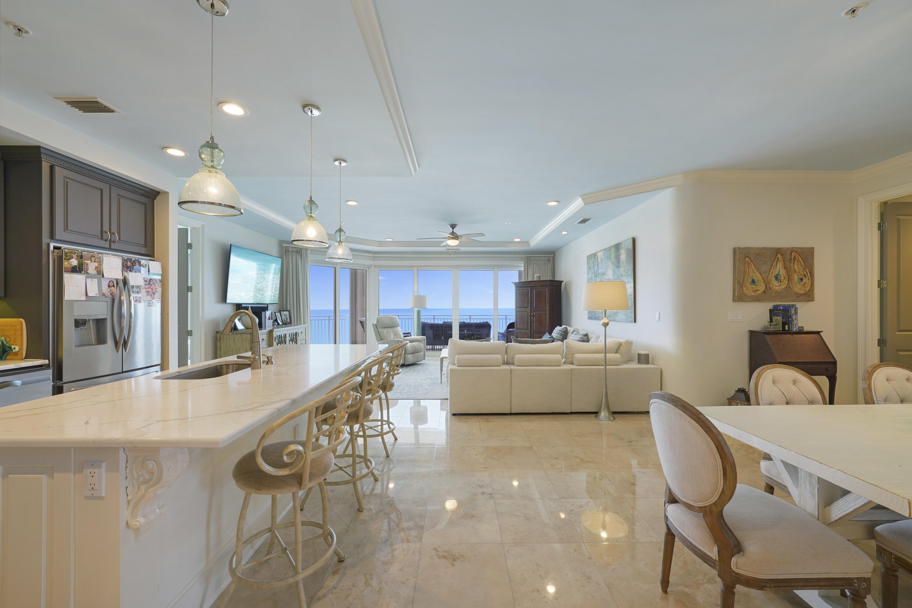 Experience the epitome of luxury in this exclusive, beachfront villa in Miramar Beach, where rentals are restricted. This exquisite 4-bedroom, 4-bathroom residence spans 2,844 sq. ft. and is perched on the 18th floor of Grand Dunes II, offering a coveted 20th-floor elevation with unparalleled Gulf of Mexico views. The highly desirable ''50'' stack floor plan, known for its exceptional layout, is available partially furnished for added convenience. Upon entering, you're greeted by a stunning open-concept living space designed for both comfort and elegance. Floor-to-ceiling windows flood the space with natural light and provide sweeping, panoramic views of the emerald waters. The Villa features a private entry foyer with honed travertine flooring, expansive 9.5' ceilings, and "Super Quiet" interiors. It's pre-wired for the latest security and home entertainment systems and boasts solid wood doors and oversized glass windows framing the Gulf vistas.

The gourmet kitchen is a chef's dream, equipped with high-end stainless steel appliances including a GE 5-burner natural gas cooktop, updated refrigerator, dishwasher, ice maker, and microwave. Custom Quartz countertops, a Quartz bar, and custom-painted cabinetry with soft-close drawers complete the luxurious space.  The Primary Suite is a serene retreat with "His & Hers" walk-in closets, trayed and coffered ceilings, and a sitting area. The en-suite bath features dual Quartz vanities, a separate dual-head shower, a spa-like jetted soaking tub with a travertine surround, and a separate water closet.

Savor your morning coffee while watching the sunrise over the water, or unwind with a glass of wine as the sun sets on the horizon.  Step out onto the expansive 11' deep Gulf-front balcony, offering over 350 sq. ft. of space with a built-in natural gas grill all protected by "Hurricane Shutters."

Grand Dunes offers: "Super Quiet Interiors", 24 hour security, gated entry, lush landscaping, 3 levels of gated underground parking for owners, grand lobby, semi-private elevators leading into your private foyer, private heated pool & hot tub, Owner's Lounge with Gulf front Fitness Room, Overflow suites for guests, 200' of deeded beach, serene streams, majestic waterfall and a Lagoon Style Gulf front pool area with Hot Tub shared by both buildings and Beach Service.

Grand Dunes is the Emerald Coast's Most Desired Rental Restricted Beachfront Development!

Call us today to schedule your private viewing of this gorgeous Villa!