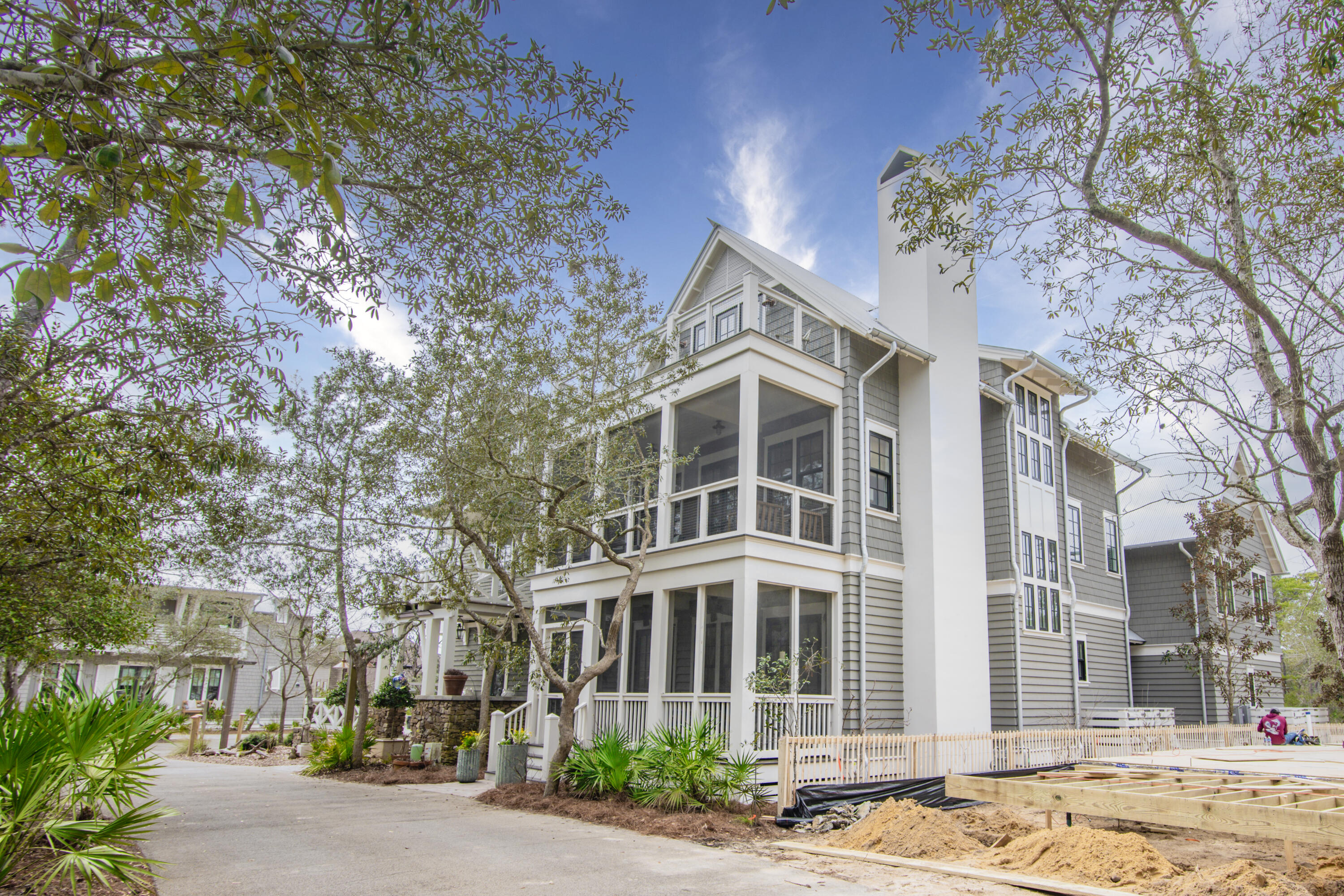 This stunning 6 bedroom home sits atop Observation Tower Park, offering breathtaking Gulf views from its top floor. Enjoy a morning coffee with your furry friend on the front porch and take a leisurely stroll through the park, or head down to the boathouse for a day on the water. This spacious home is perfect for a large family or an empty nester with a lot of friends. The carriage house includes a kitchenette and a separate bedroom and bathroom, while the main house features five bedrooms - three on the second floor that can serve as an additional sitting room or study. The house also includes ample storage space and a large two-car garage and work area located underneath the carriage house. Designed as a forever home, Draper Lake Coastal Village boasts two community pools and two... boathouses, offering plenty of opportunities for relaxation and recreation!