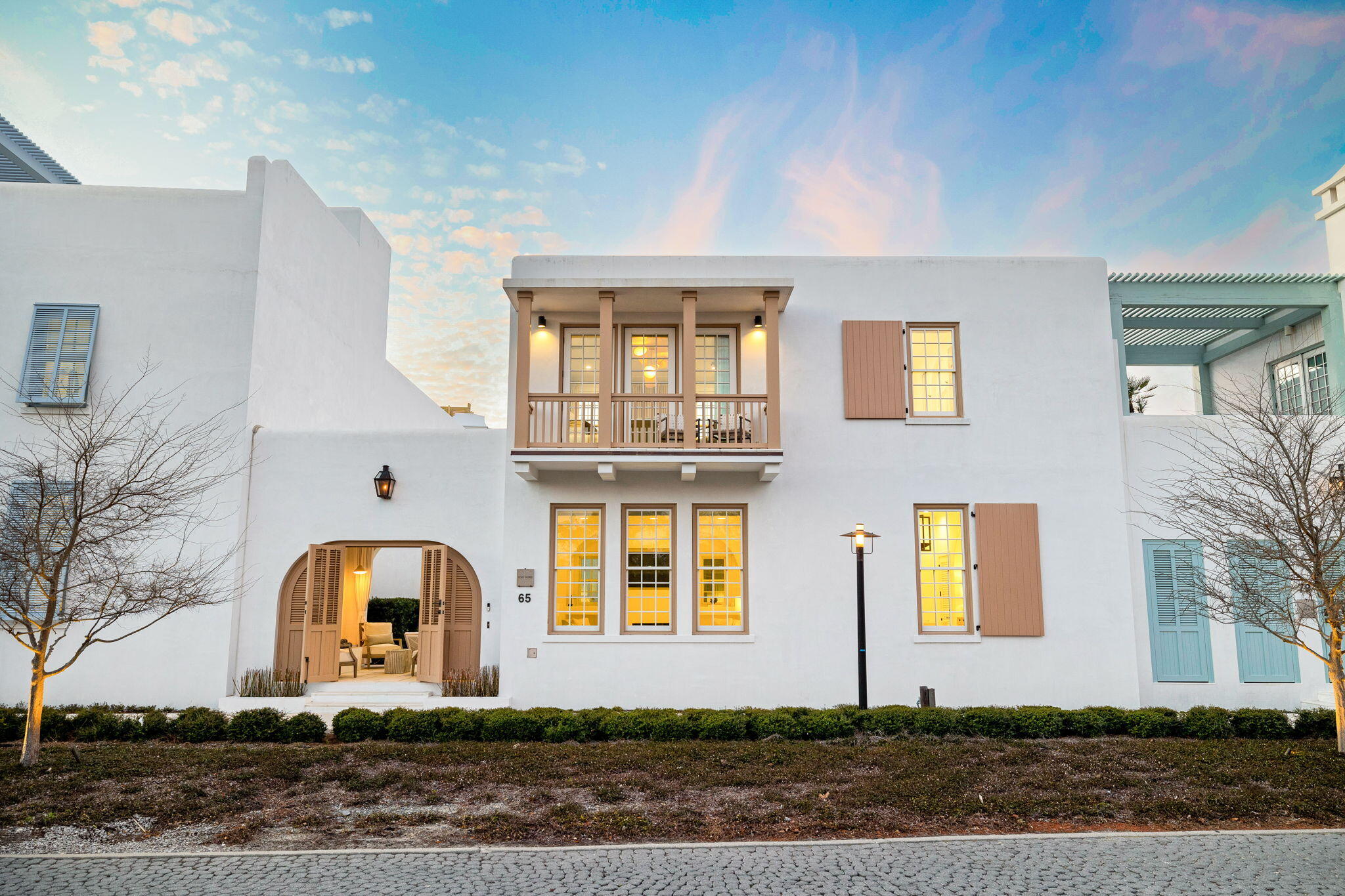Nestled in the exclusive Alys Beach community, this stunning Gary Justiss designed home is fully furnished and turn-key, offering the perfect blend of elegance and modern convenience. With venetian plaster throughout, the home exudes a timeless, luxurious atmosphere that flows effortlessly from room to room. The first floor features a spacious living area with a cozy fireplace, an open-concept kitchen and dining space, as well as a generous guest suite complete with an en-suite bath. The living space seamlessly extends to the loggia, which is equipped with a summer kitchen and entertaining spaces all centered around the private pool. Just off the loggia, you'll find a two-car garage. Upstairs, new furnishings, lighting, and décor by Summer Story bring a fresh, sophisticated touch to the space. Every detail has been thoughtfully curated to create an inviting, elevated environment. The primary suite is a true sanctuary, featuring a large walk-in shower with a soaking tub and a skylight that fills the space with natural light. The bedroom also boasts custom drapery and a private balcony, offering a serene spot to enjoy morning coffee or watch the sunset. The home is equipped with Control4 automation, enhancing the living experience by providing seamless control of lighting, music, and custom electric shades at the touch of a button. Just steps from the town center and Zuma Wellness Center, this home provides convenient access to world-class dining, shopping, and wellness amenities, making it the ultimate coastal retreat. Alys Beach offers a range of exceptional experiences, from dining at popular restaurants like The Citizen, George's, and Oku, to boutique shopping and relaxing at Fonville Press. Residents also enjoy access to exclusive amenities, including the private Zuma fitness center, the Caliza Pool, and the owners-only Beach Club.
**Buyer to verify all information, including fees and dimensions.**